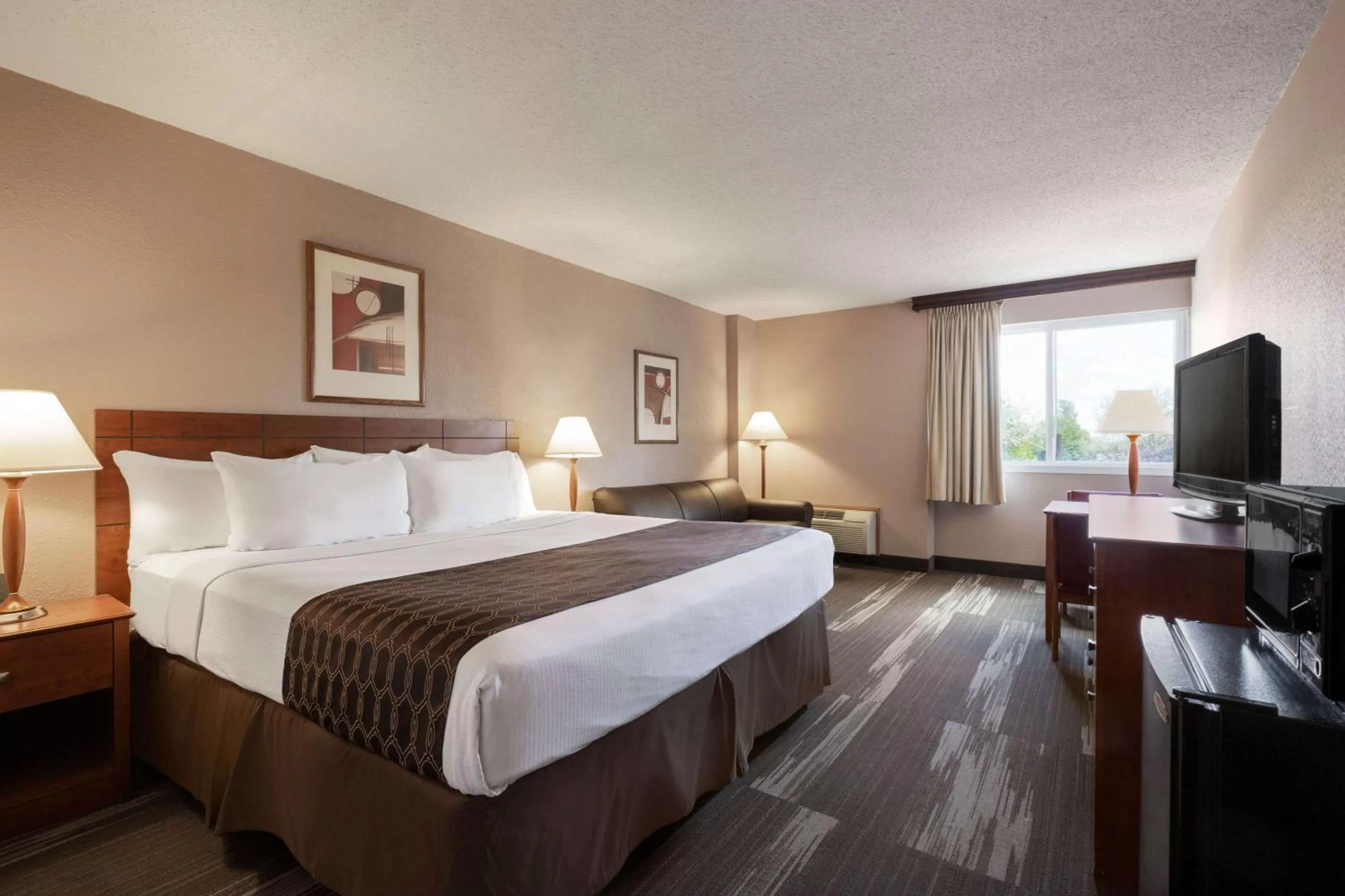 Photo of the whole room, Bed in Ramada by Wyndham Bismarck