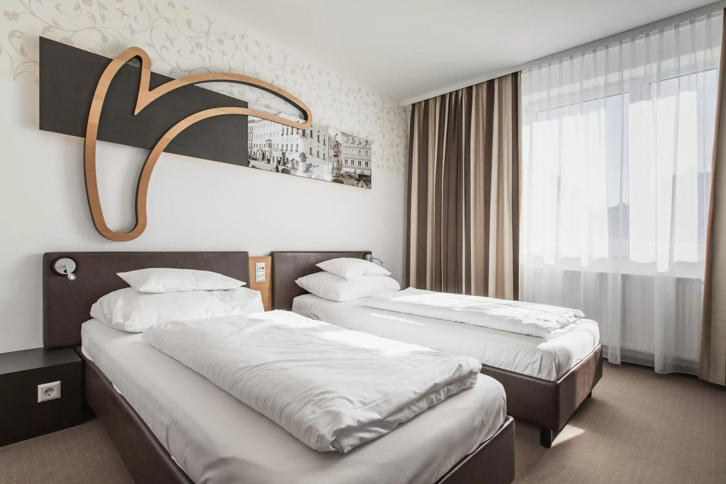 Standard Twin Room - single occupancy in H+ Hotel Ried Standard Twin Room - single occupancy in H+ Hotel Ried