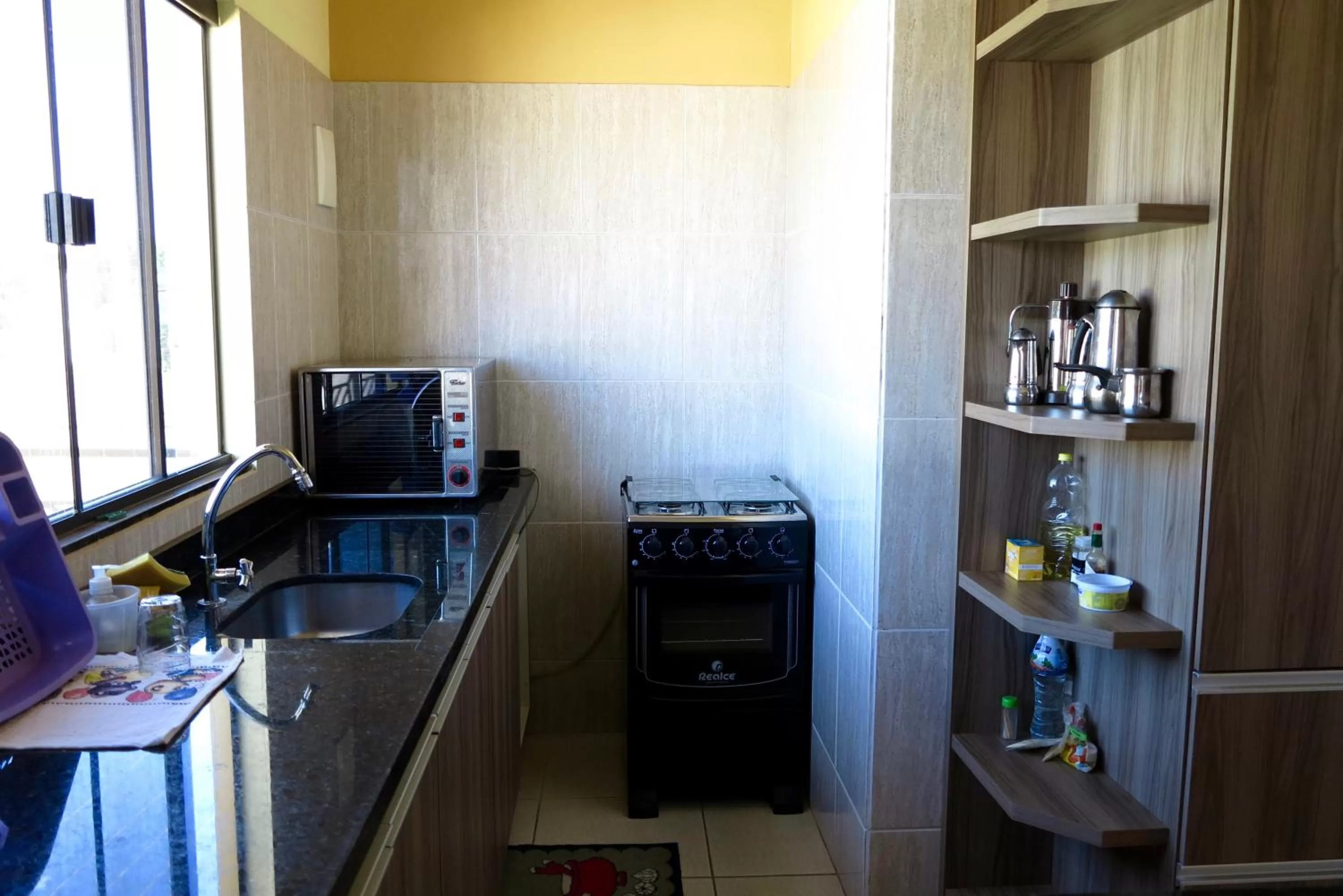 Property building, Kitchen/Kitchenette in Pousada Corazao Sagradao