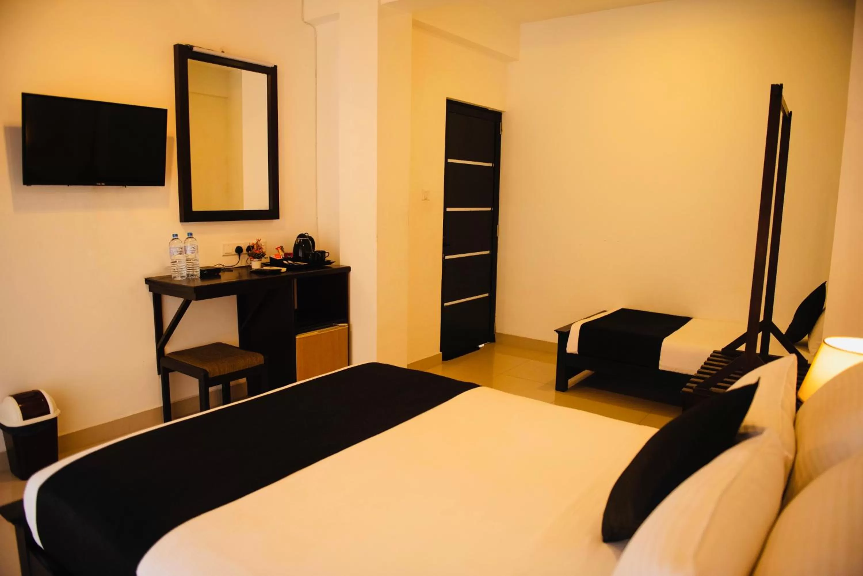 Bed, TV/Entertainment Center in 49 Ella