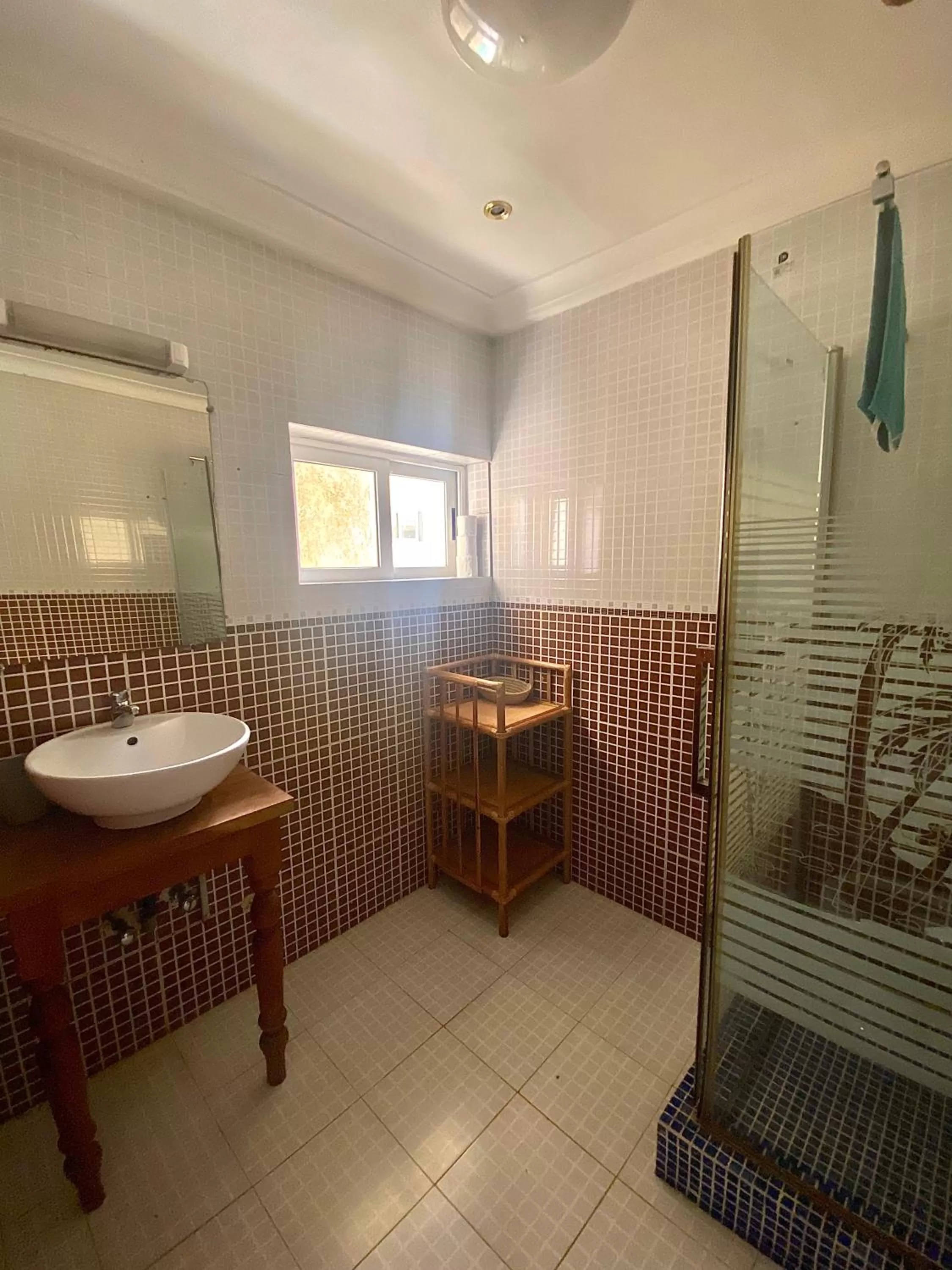 Bathroom in L'Oasis Guesthouse