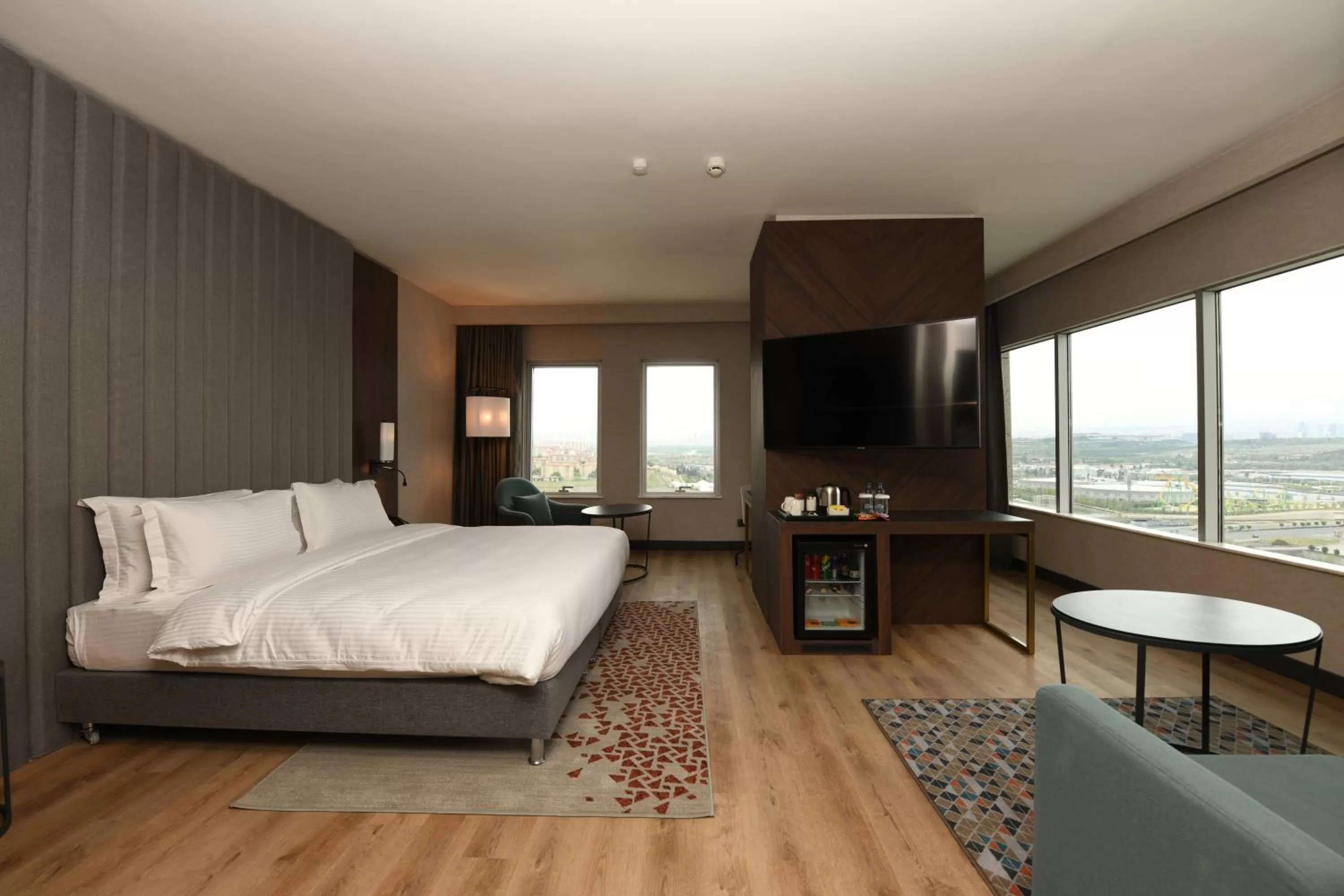 Seating area, Bed in Crowne Plaza Ankara by IHG