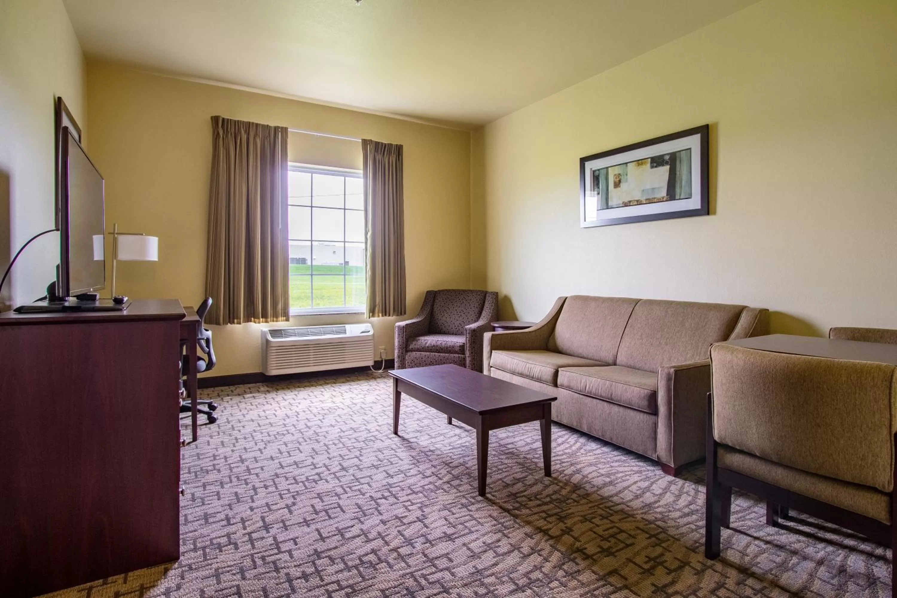 Living room in Cobblestone Hotel & Suites - Orrville