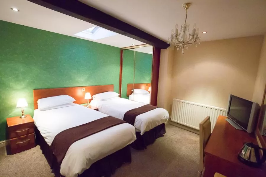 Bed in The Peacock Townhouse Hotel Kenilworth - Warwick