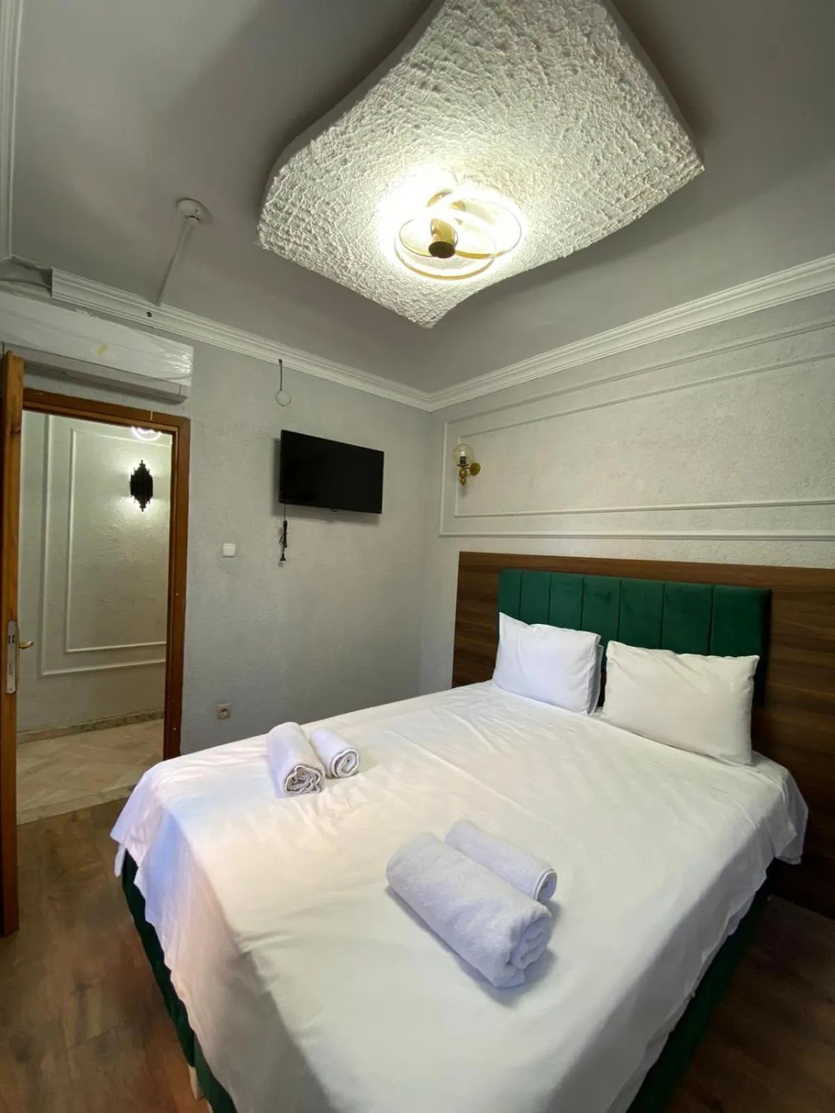 Bed in Aruna Boutique Hotel
