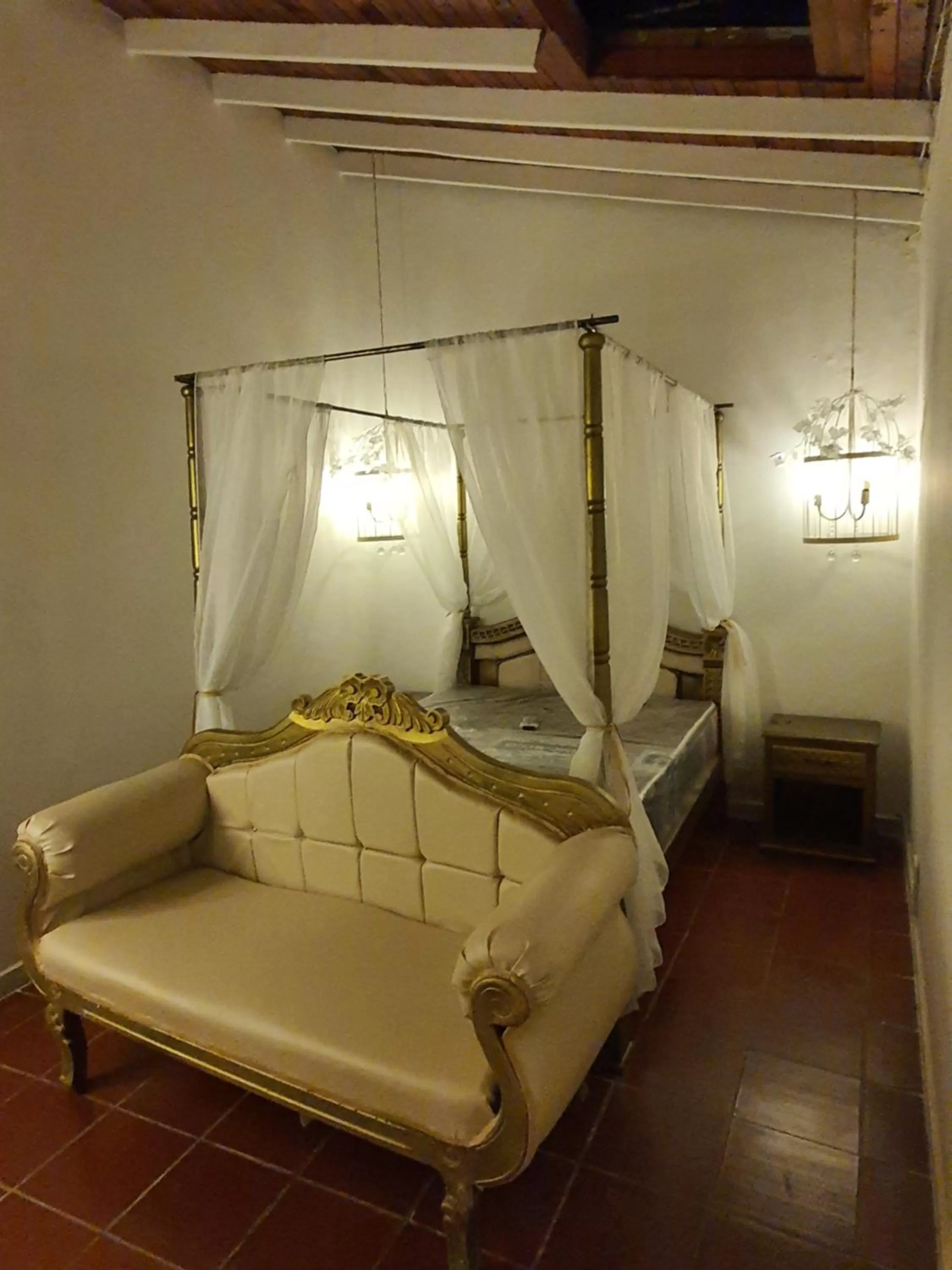 Bed in HOTEL BOUTIQUE EL FARO BY AROMAX