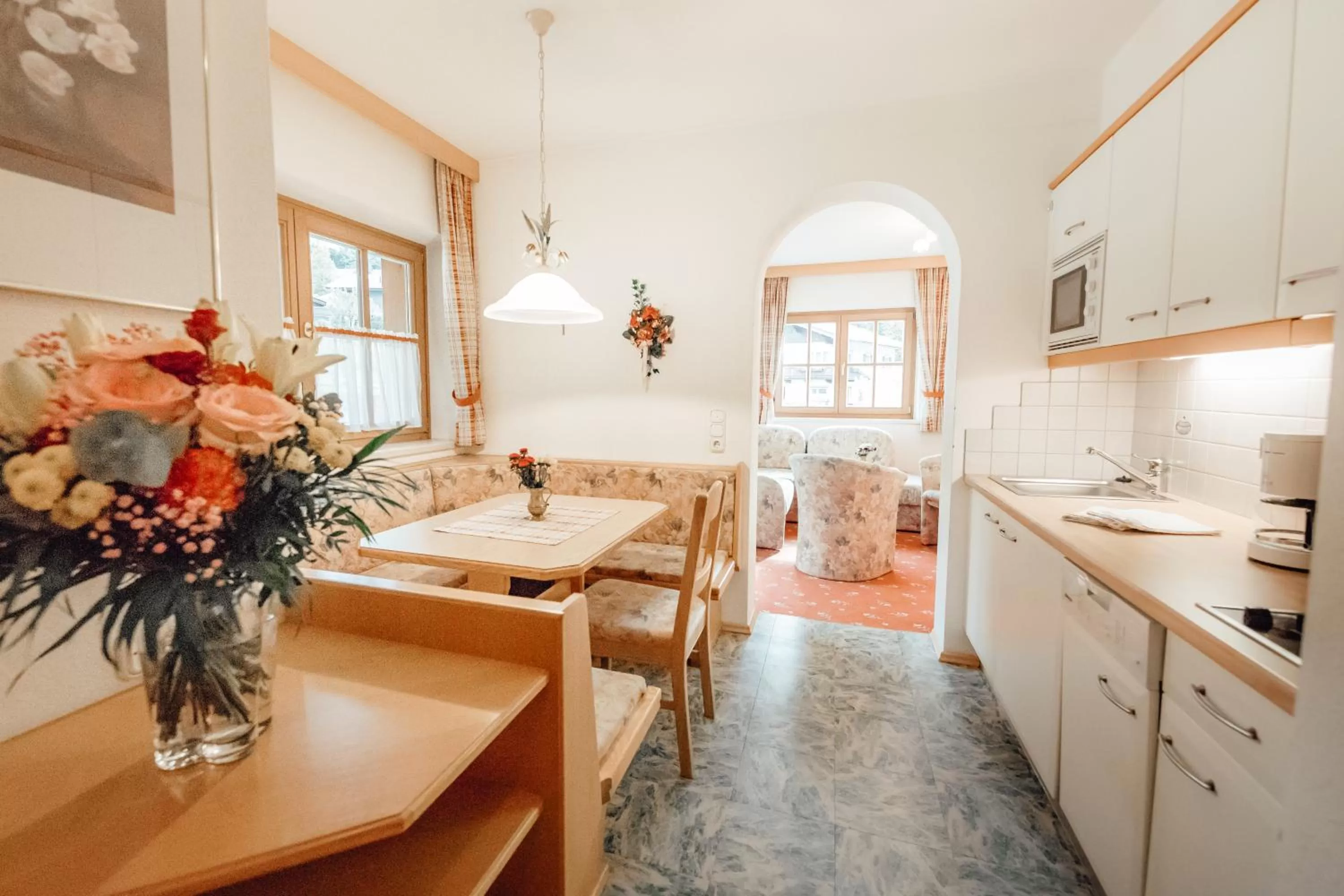 Kitchen or kitchenette in Dandler - Zimmer und Ferienwohnungen