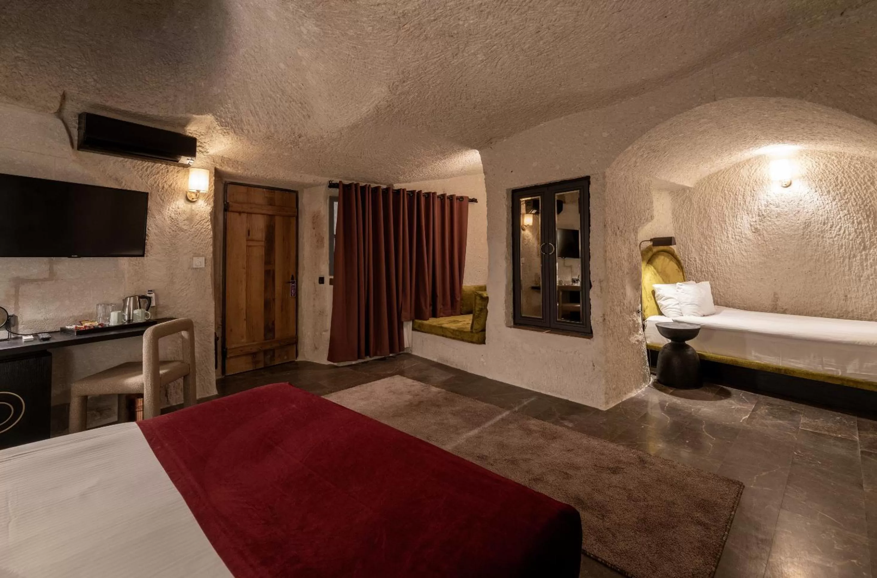 Bedroom, Bed in Artemis Cave Suites & Spa- Adults Only