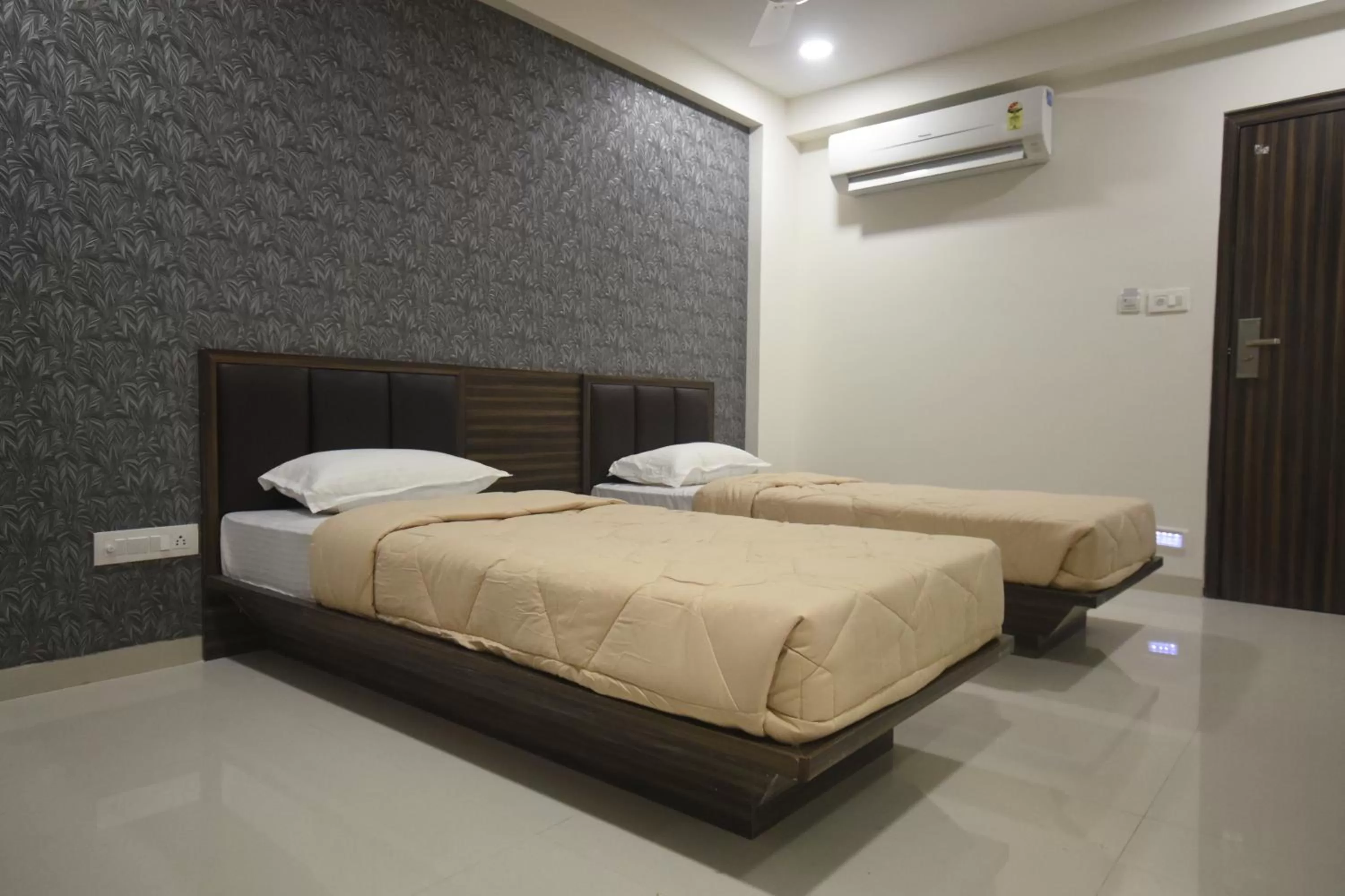 Bed in The Pacific Hotel