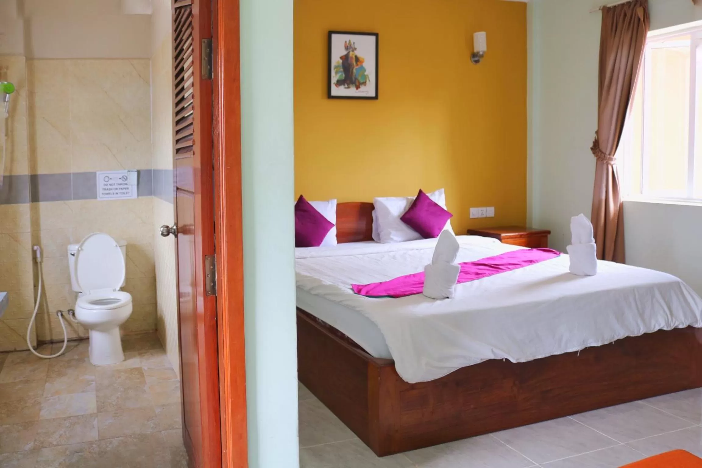 Bed in Neakru Guesthouse and Restaurant