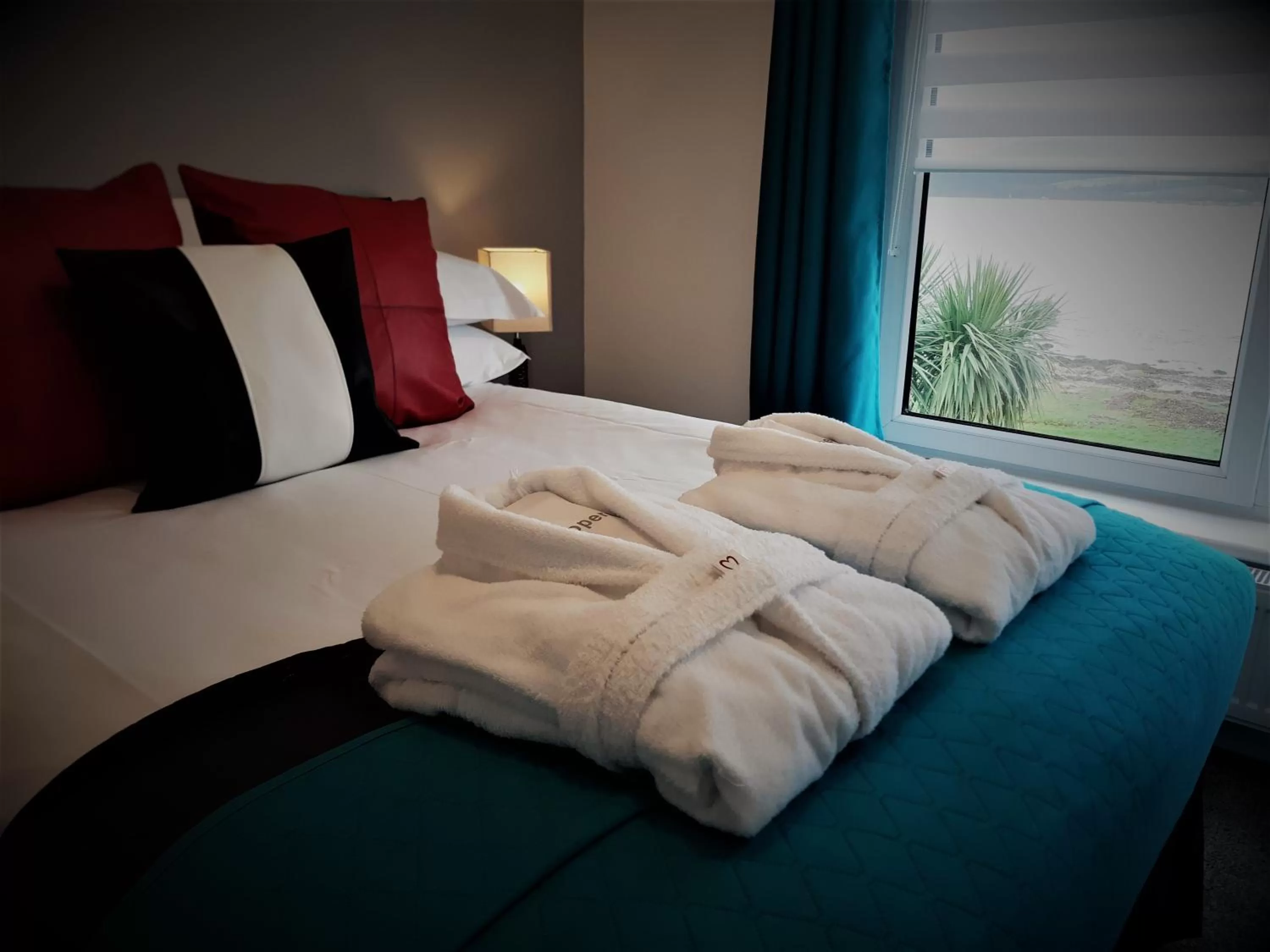 Bed in Cadillac Kustomz Hotel