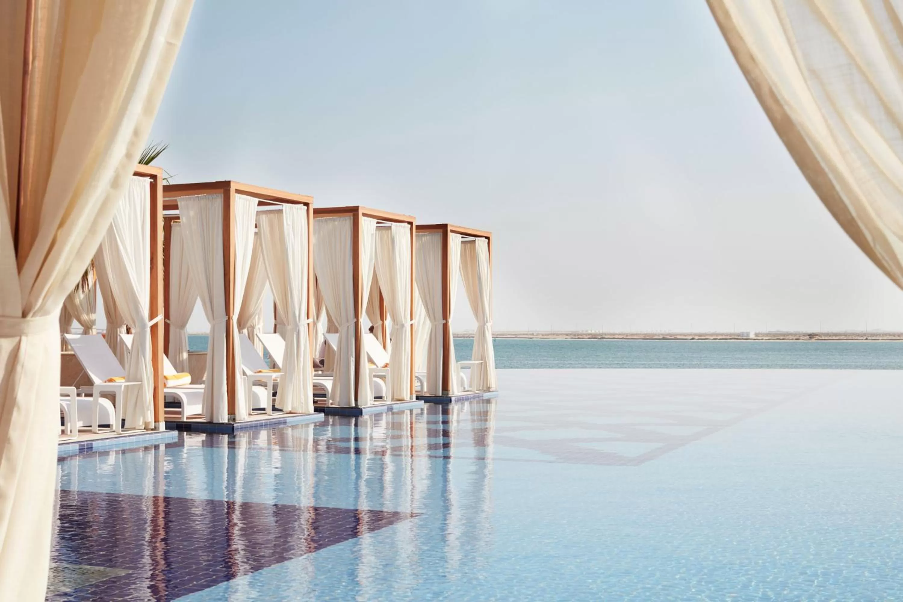 Swimming pool in Royal M Hotel Abu Dhabi by Gewan