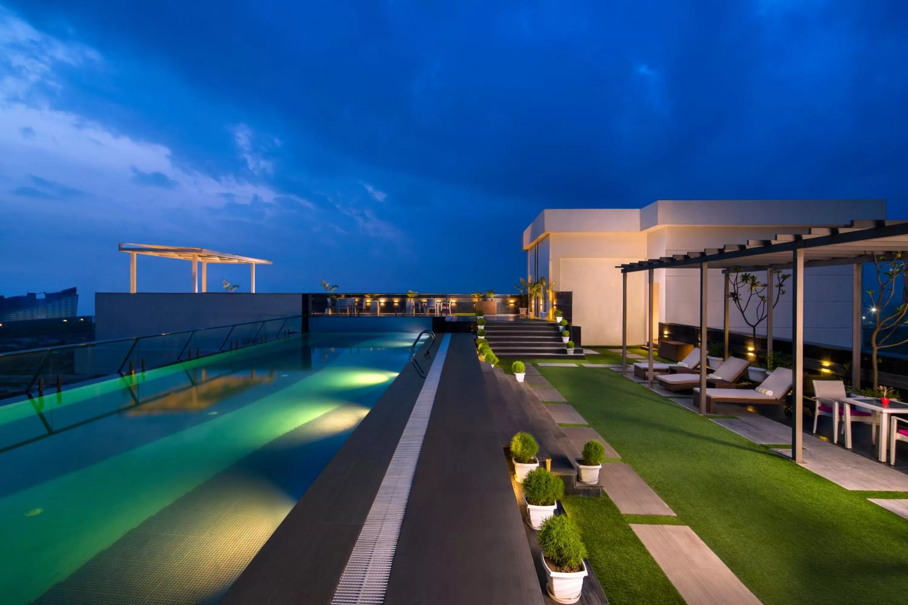 Swimming pool in Sandal Suites by Lemon Tree Hotels