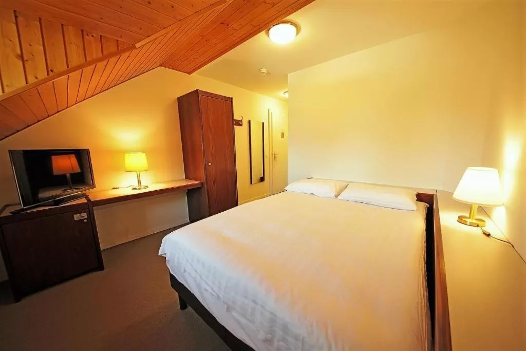 Bed in Galion Hôtel & Restaurant