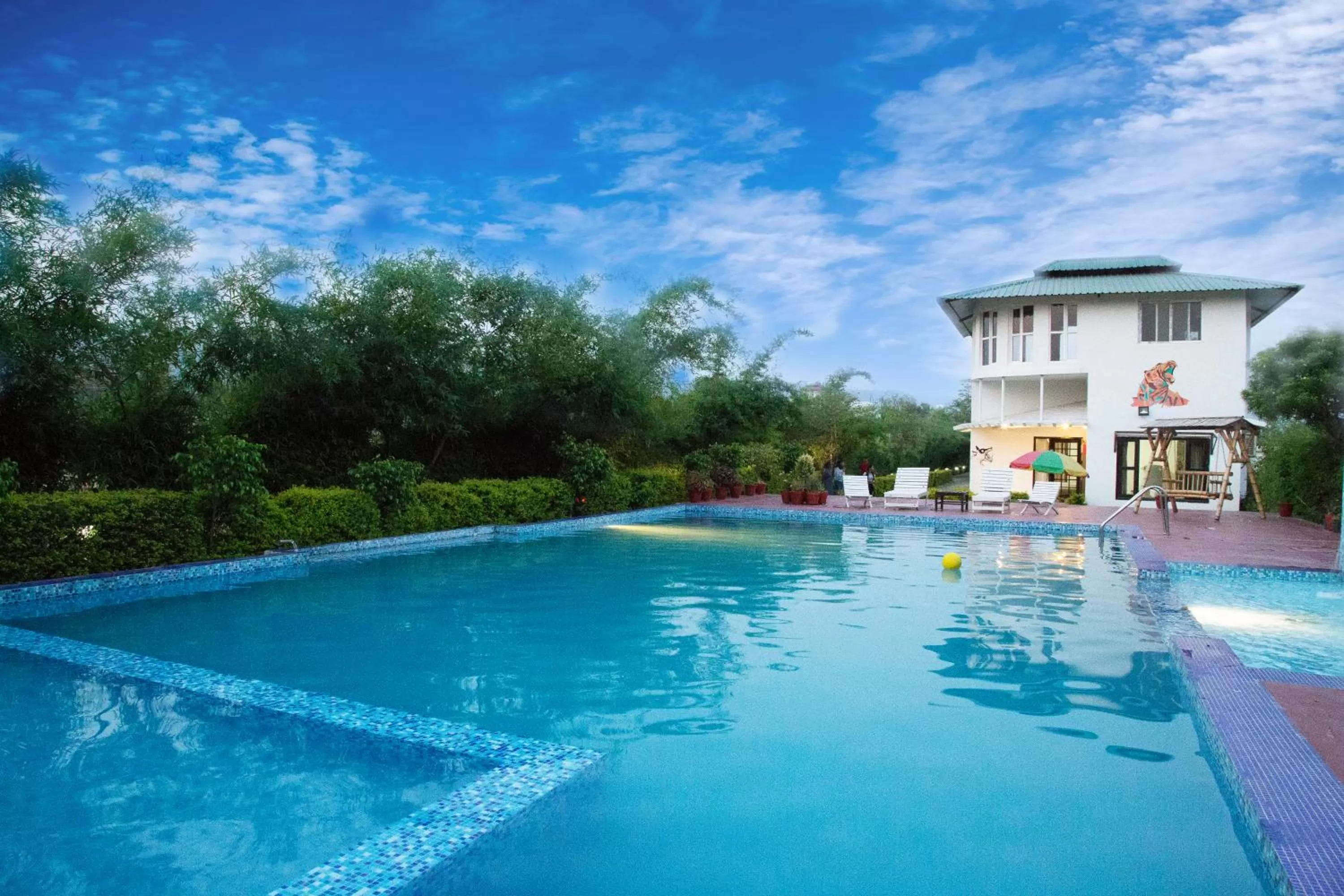 Swimming pool in Corbett Treat Resort By Atya Hotels