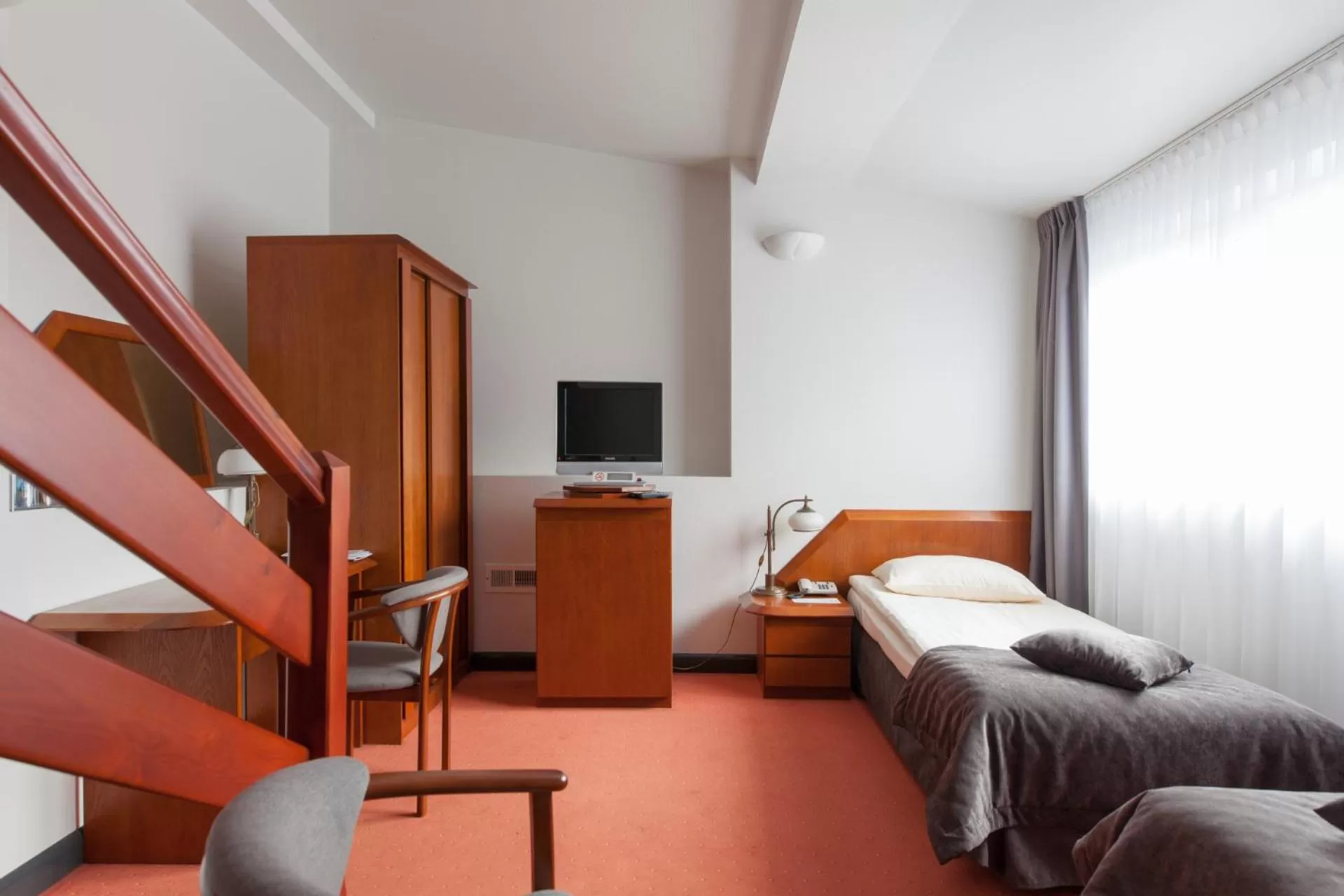 TV/Entertainment Center in Hotel Restauracja Piwnica Rycerska