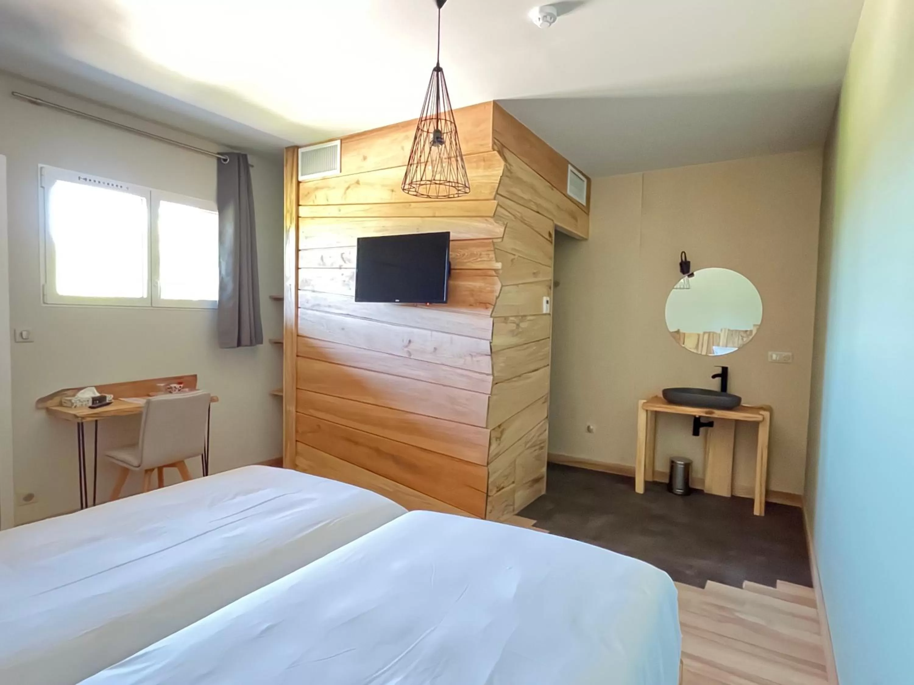 Bed in Hôtel En Tilleul