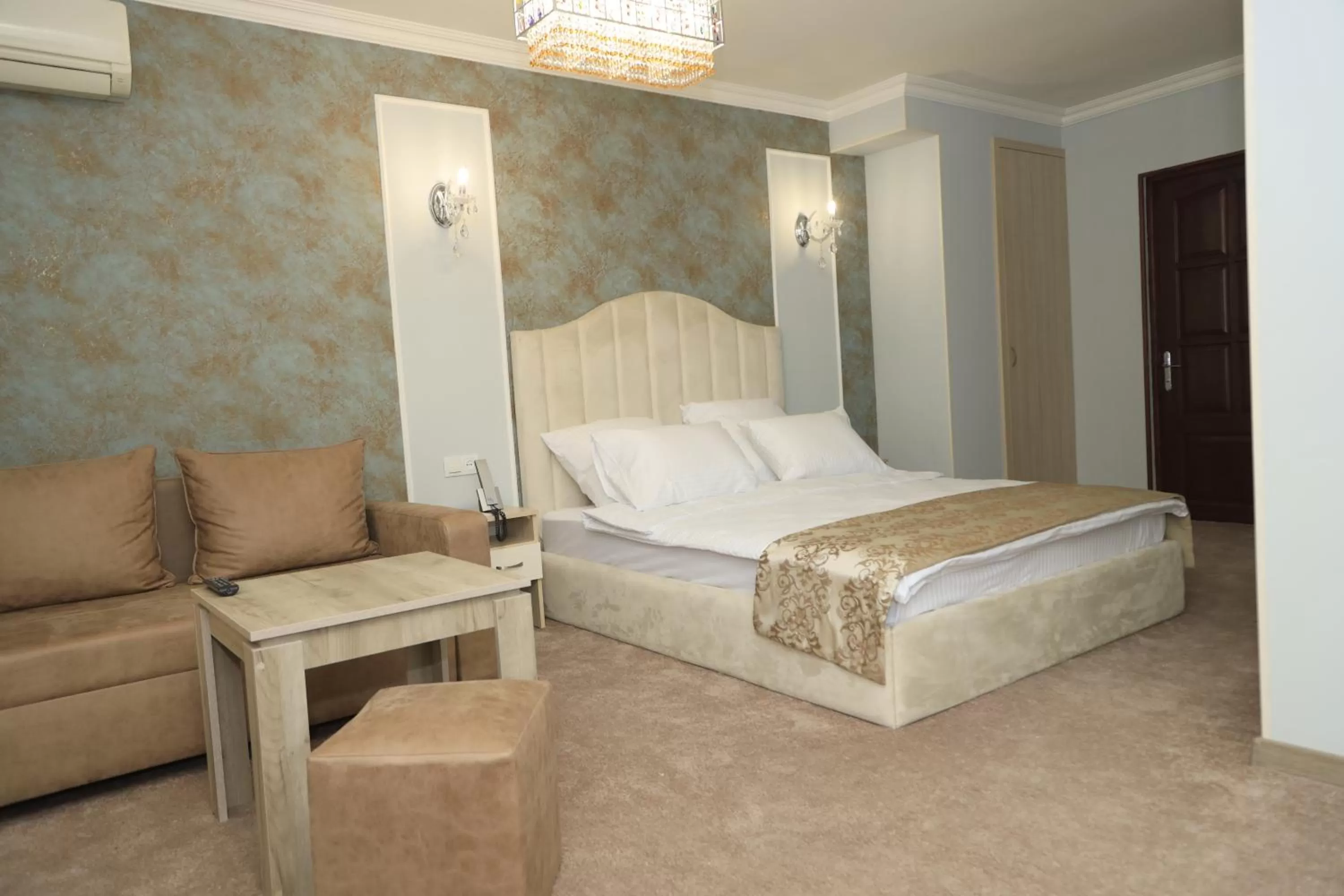 Bed in DeLin Hotel And Tours