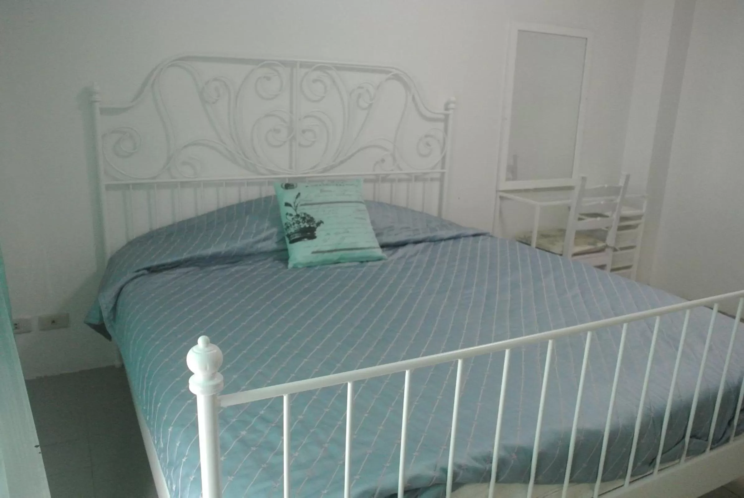 Bed in Oriental Smile Hotel