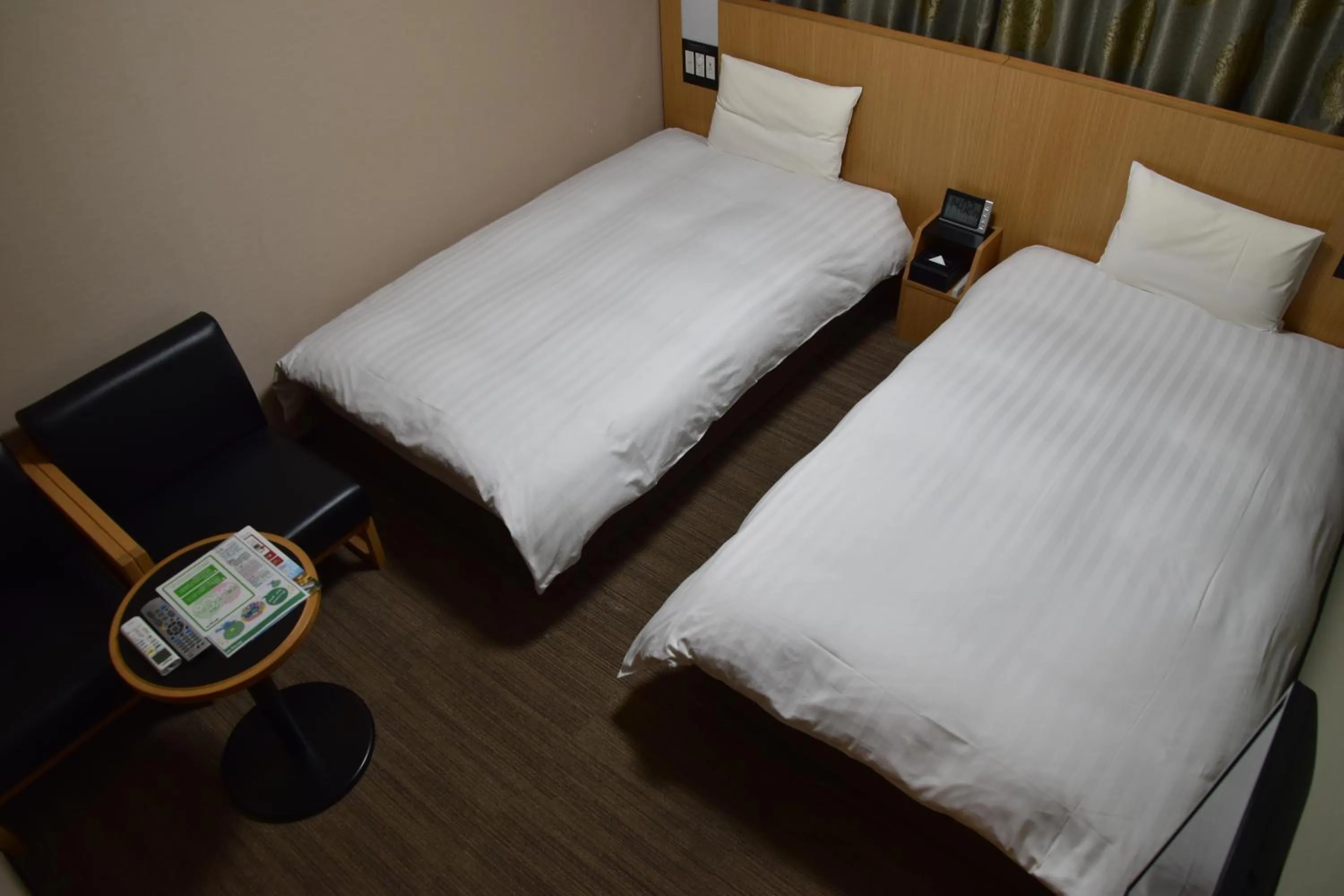 Bed in Dormy Inn Premium Tokyo Kodenmacho
