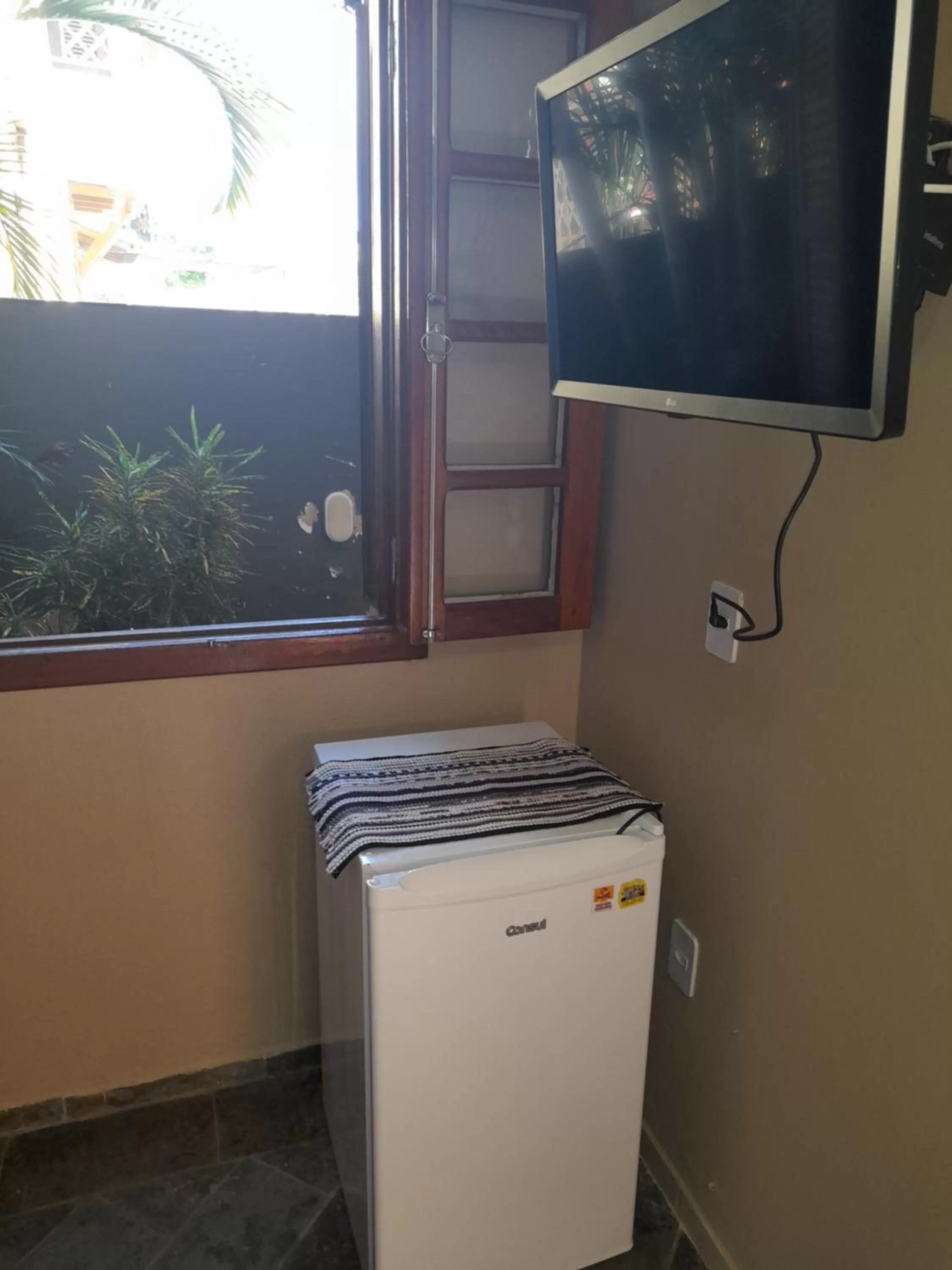 TV/Entertainment Center in Pousada Água da Fonte