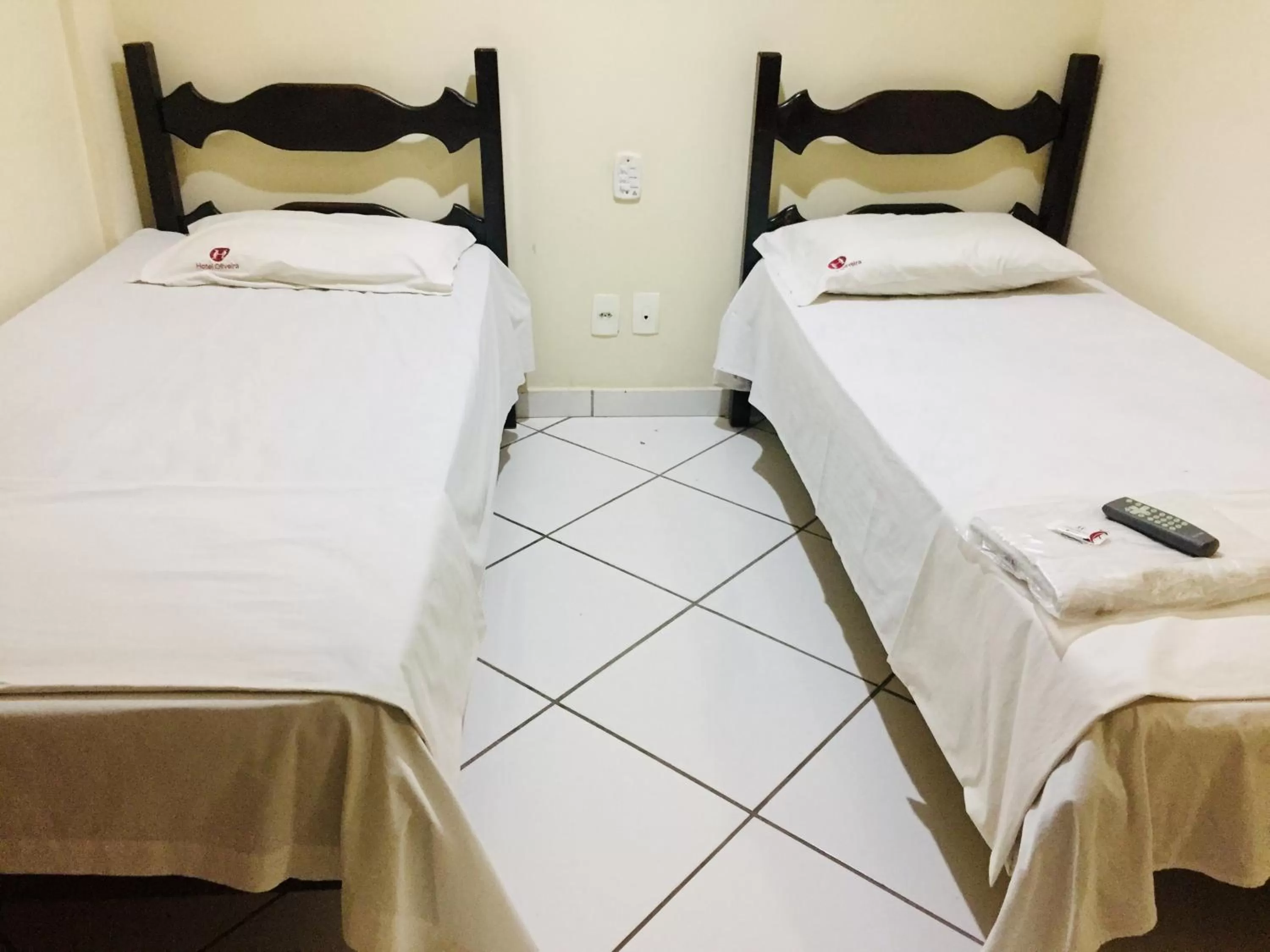 Bed in Hotel Oliveira