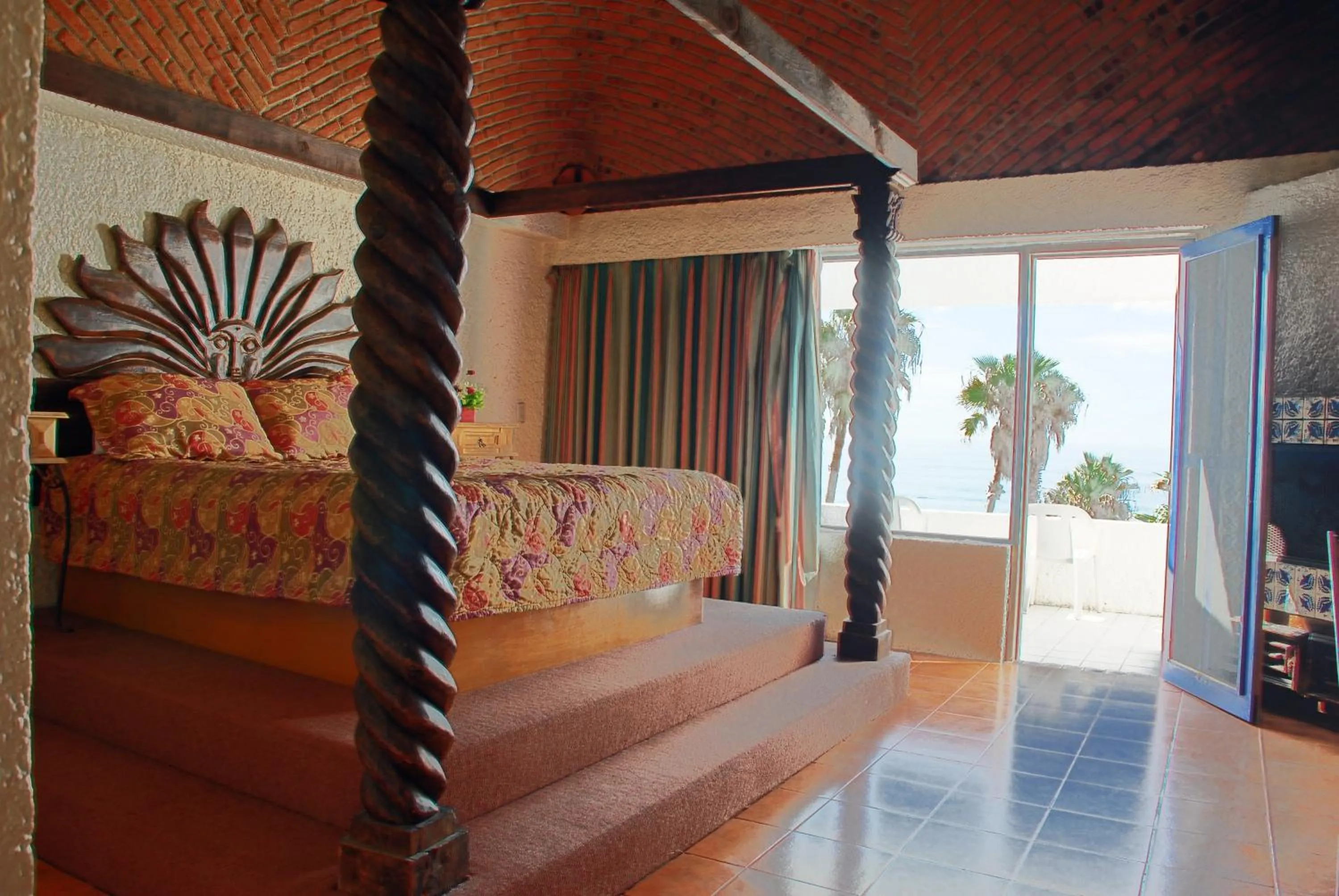 Bed in Las Rocas Resort & Spa