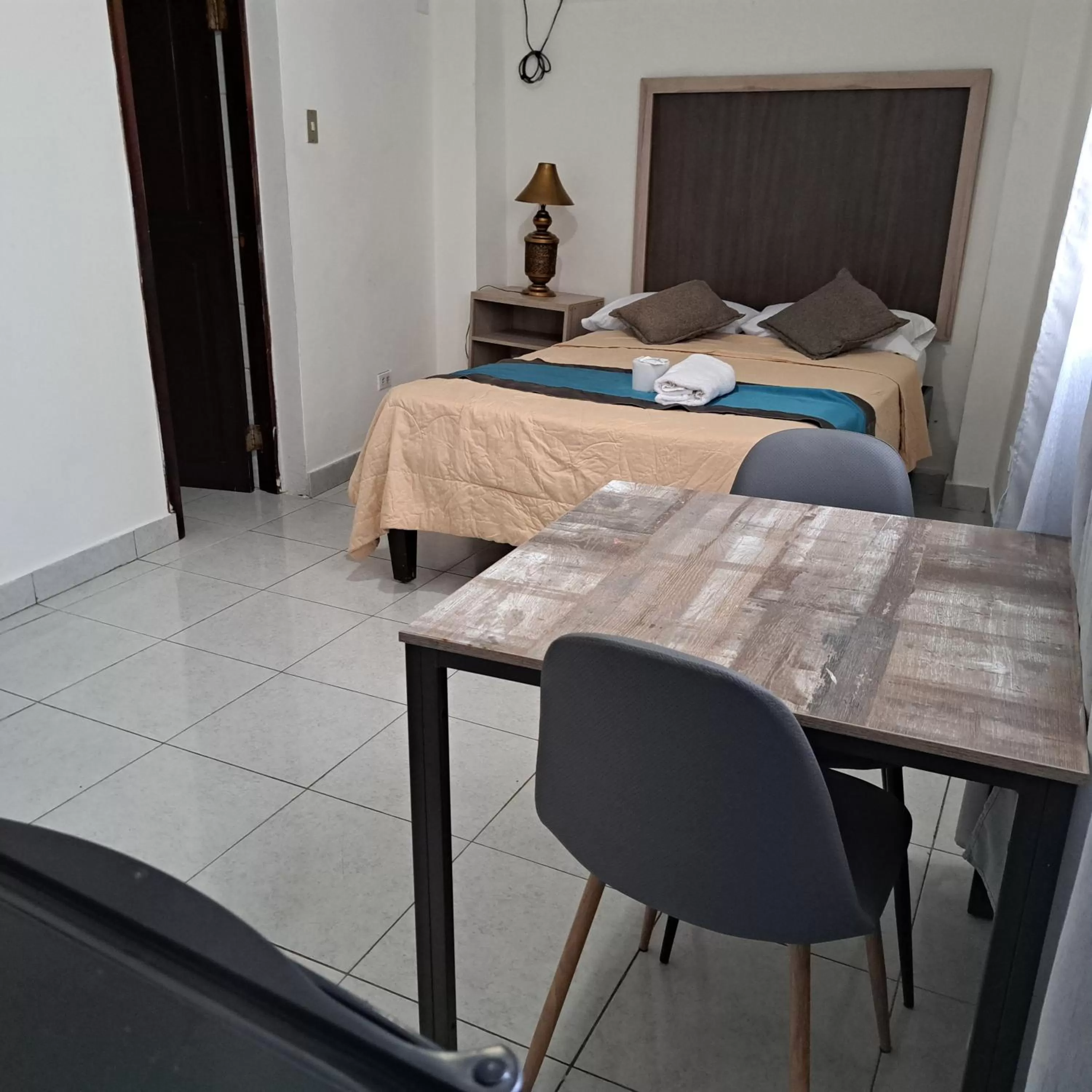 Photo of the whole room, Bed in Atlantic Suites Hotel