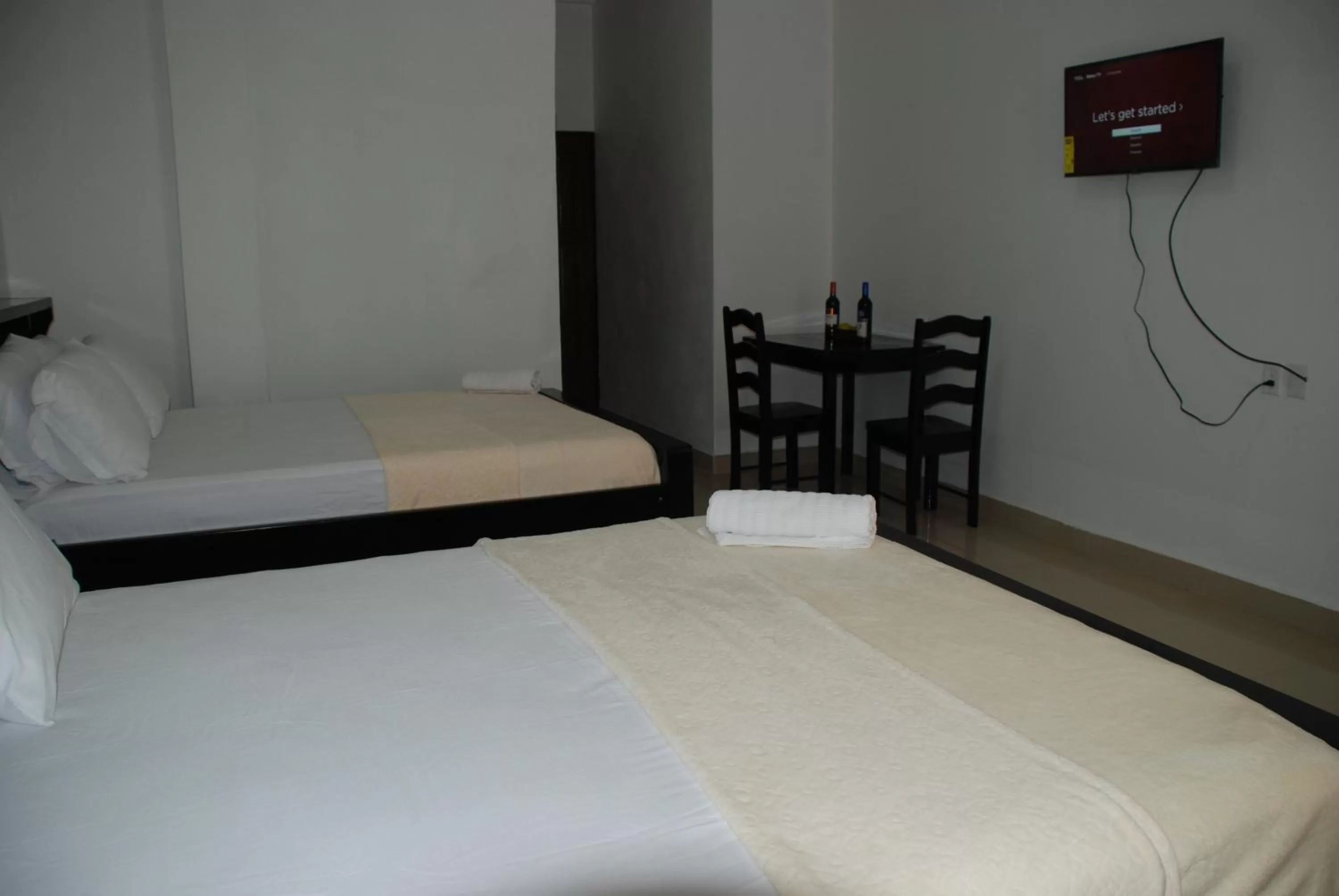 Bed in Hotel Coastalbay 2 & Golf Cart Rental