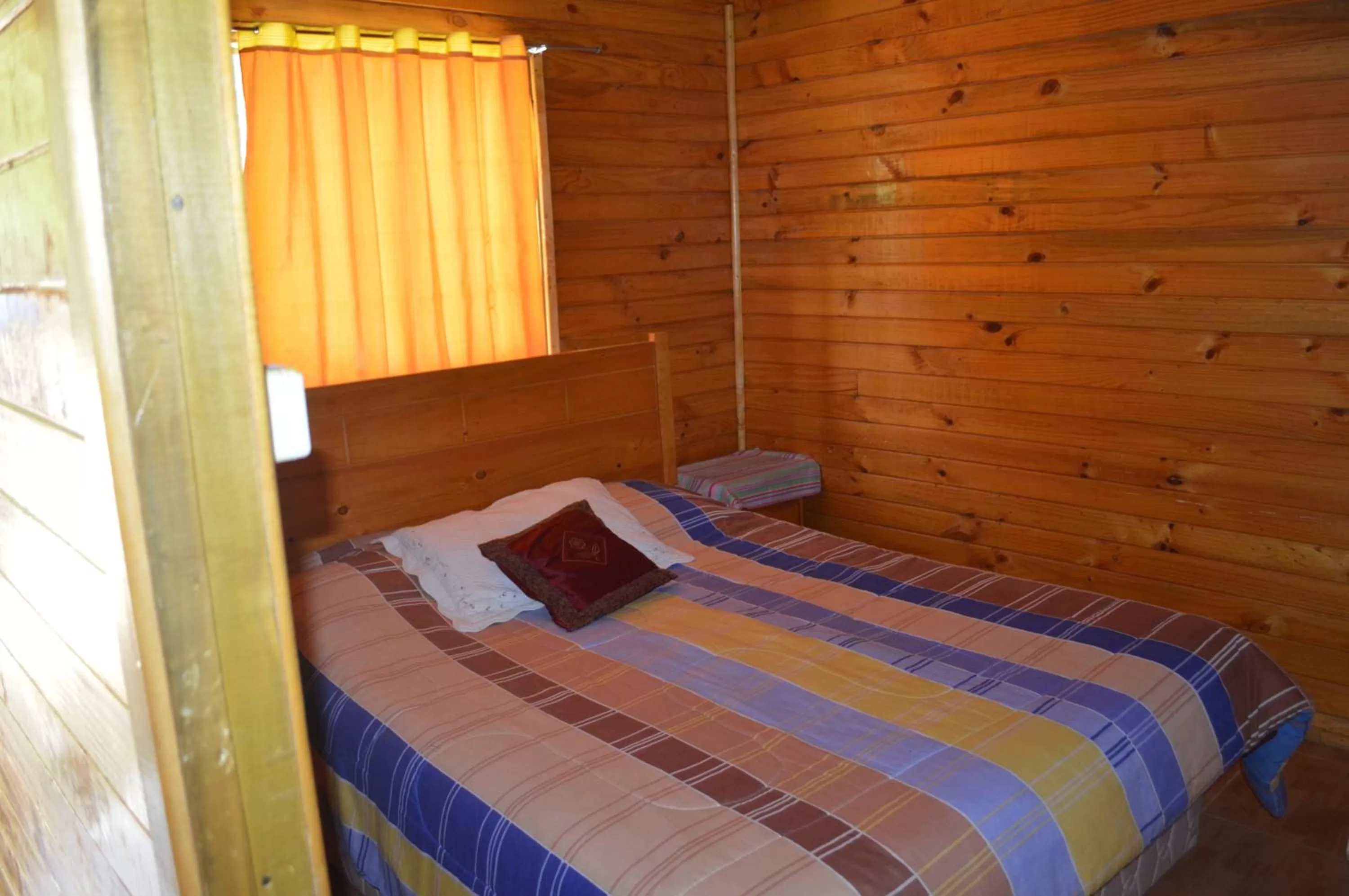 Bed in Coyunche Cabañas y Camping Laja & San Rosendo