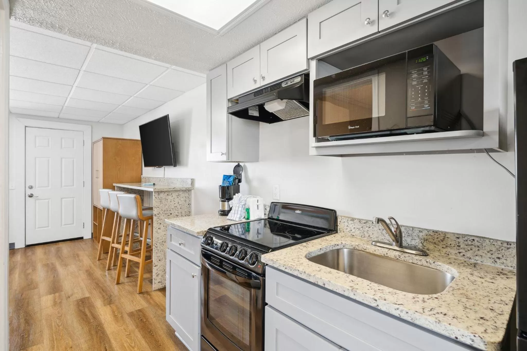 kitchen in Sugar Sands Beachfront Hotel, a By The Sea Resort
