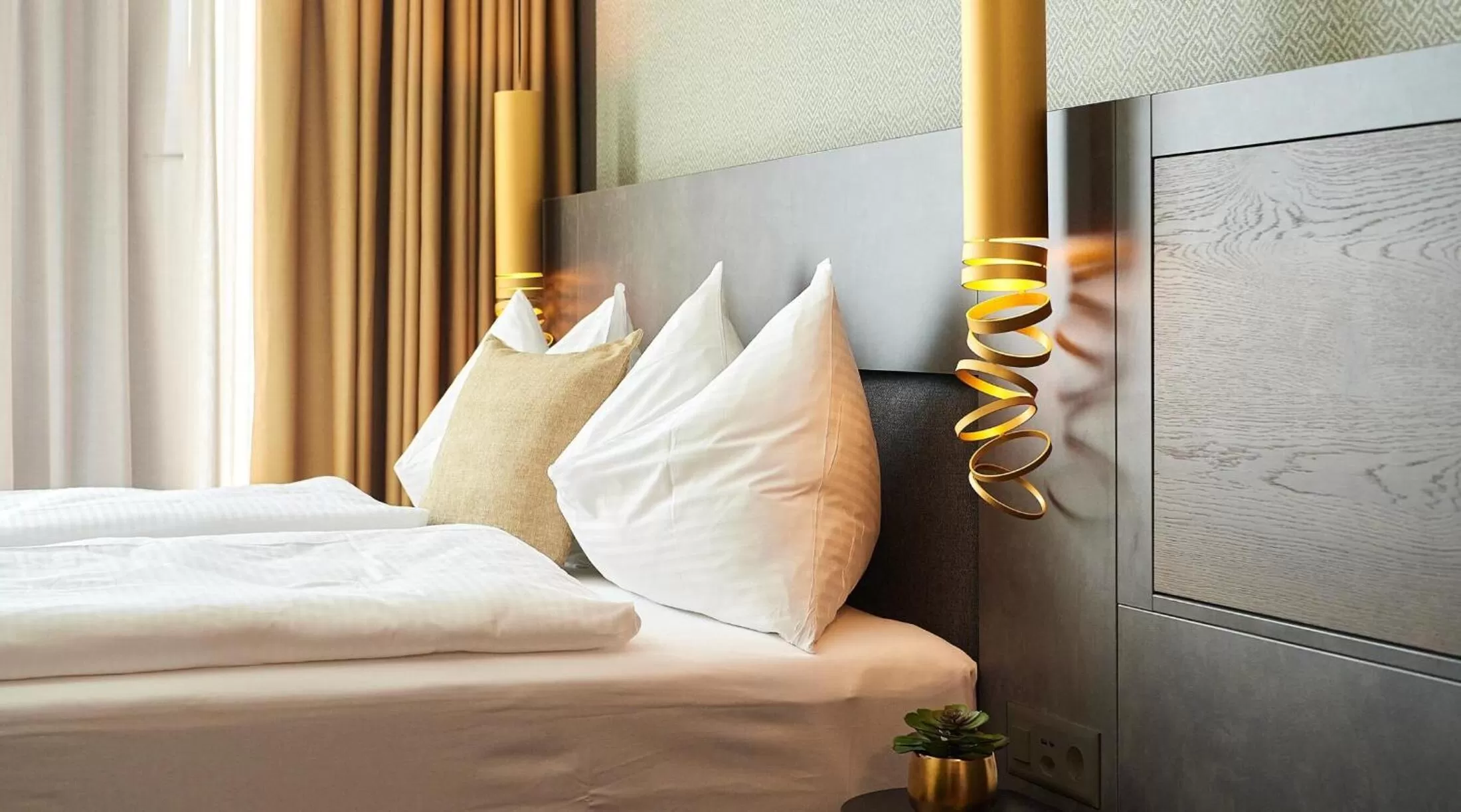 Bed in Lumen Apartments