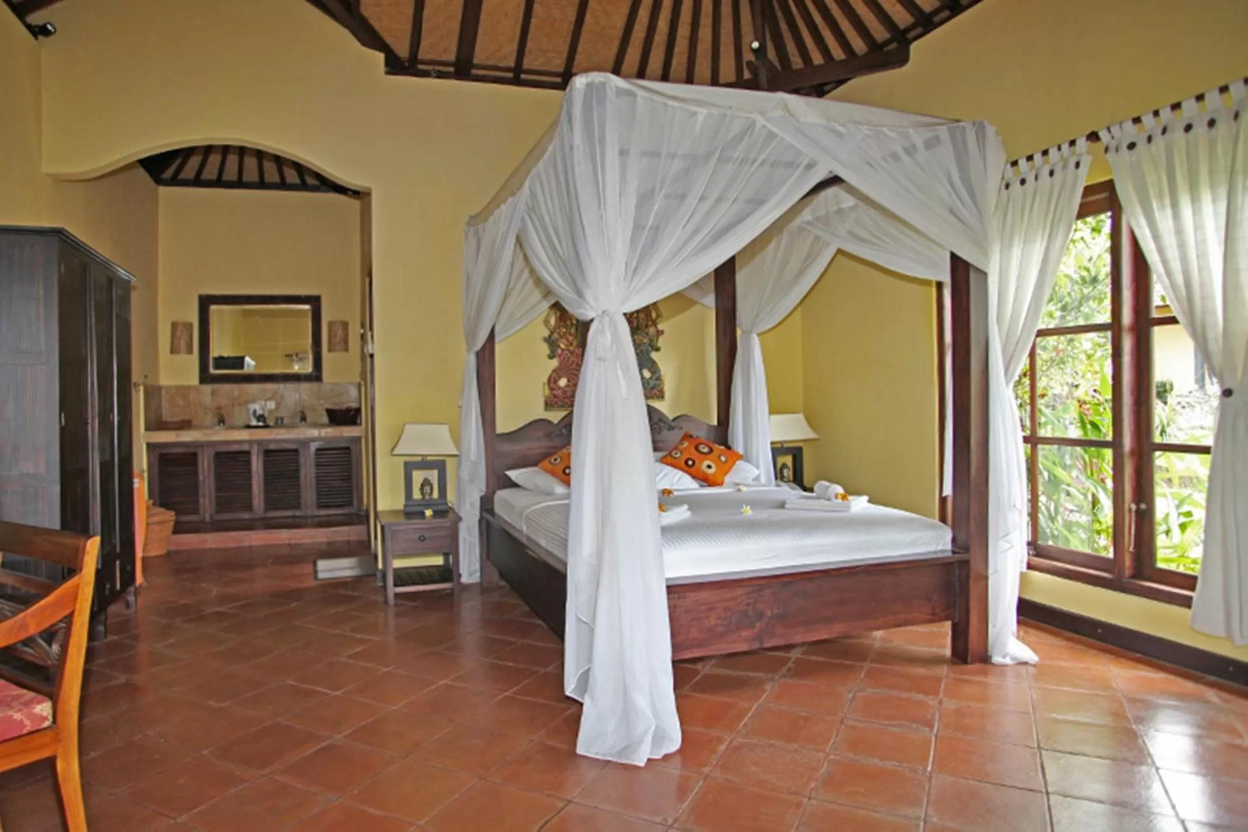 Photo of the whole room, Bed in Puri Mangga Sea View Resort and Spa