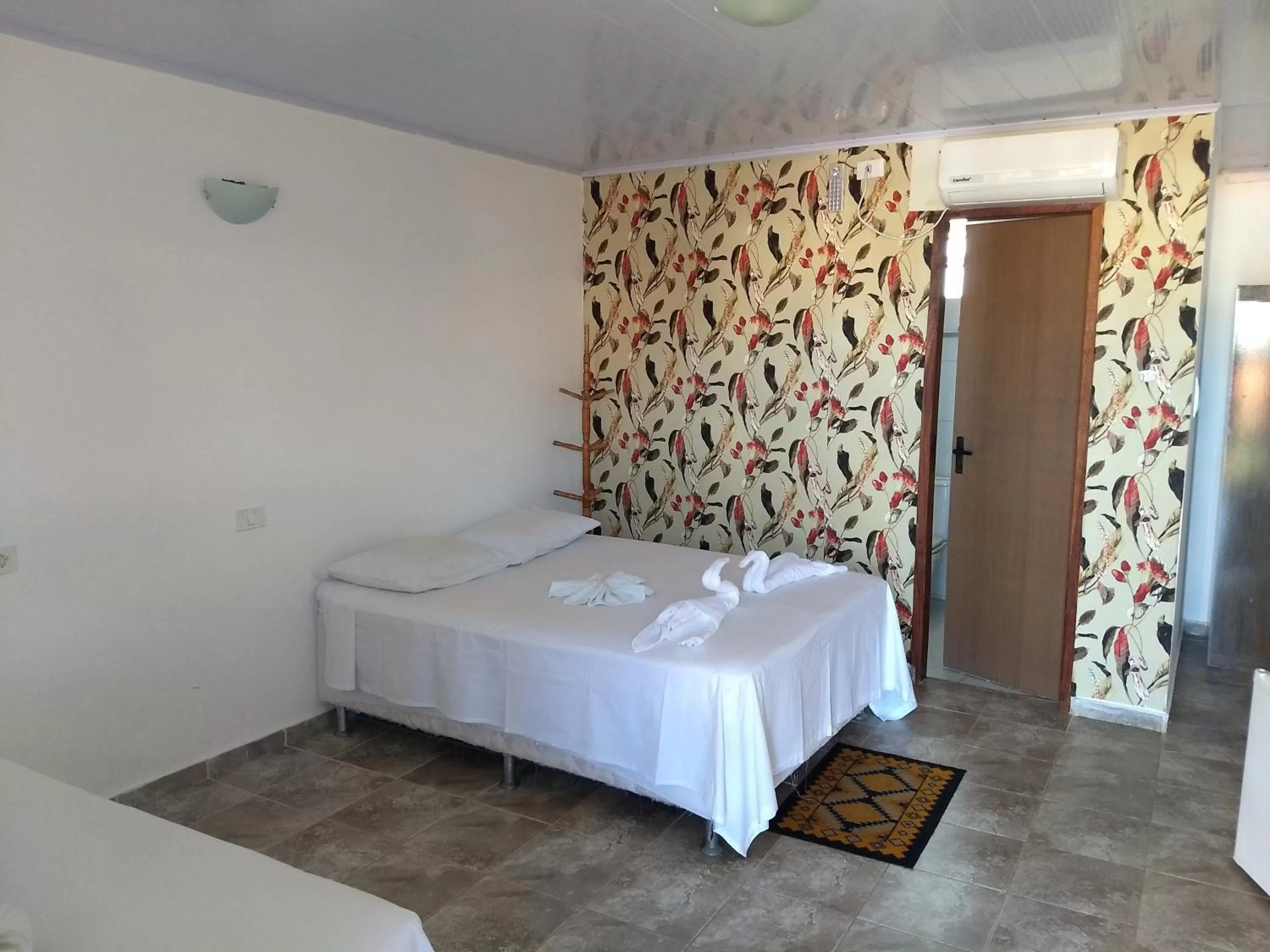 Property building, Bed in Pousada Costa Tropical