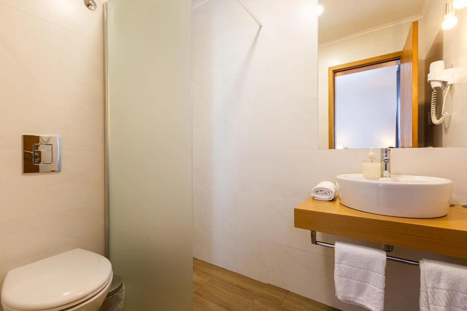 Bathroom in Hotel Arcanjo