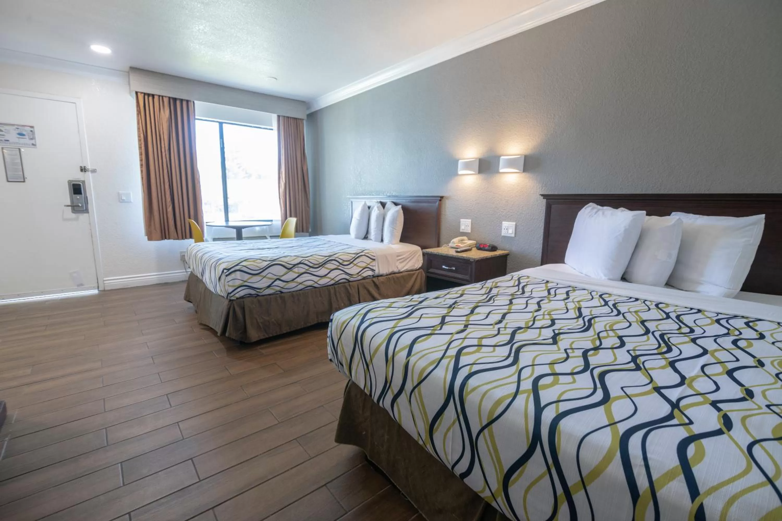 Bed in Hospitality Inn