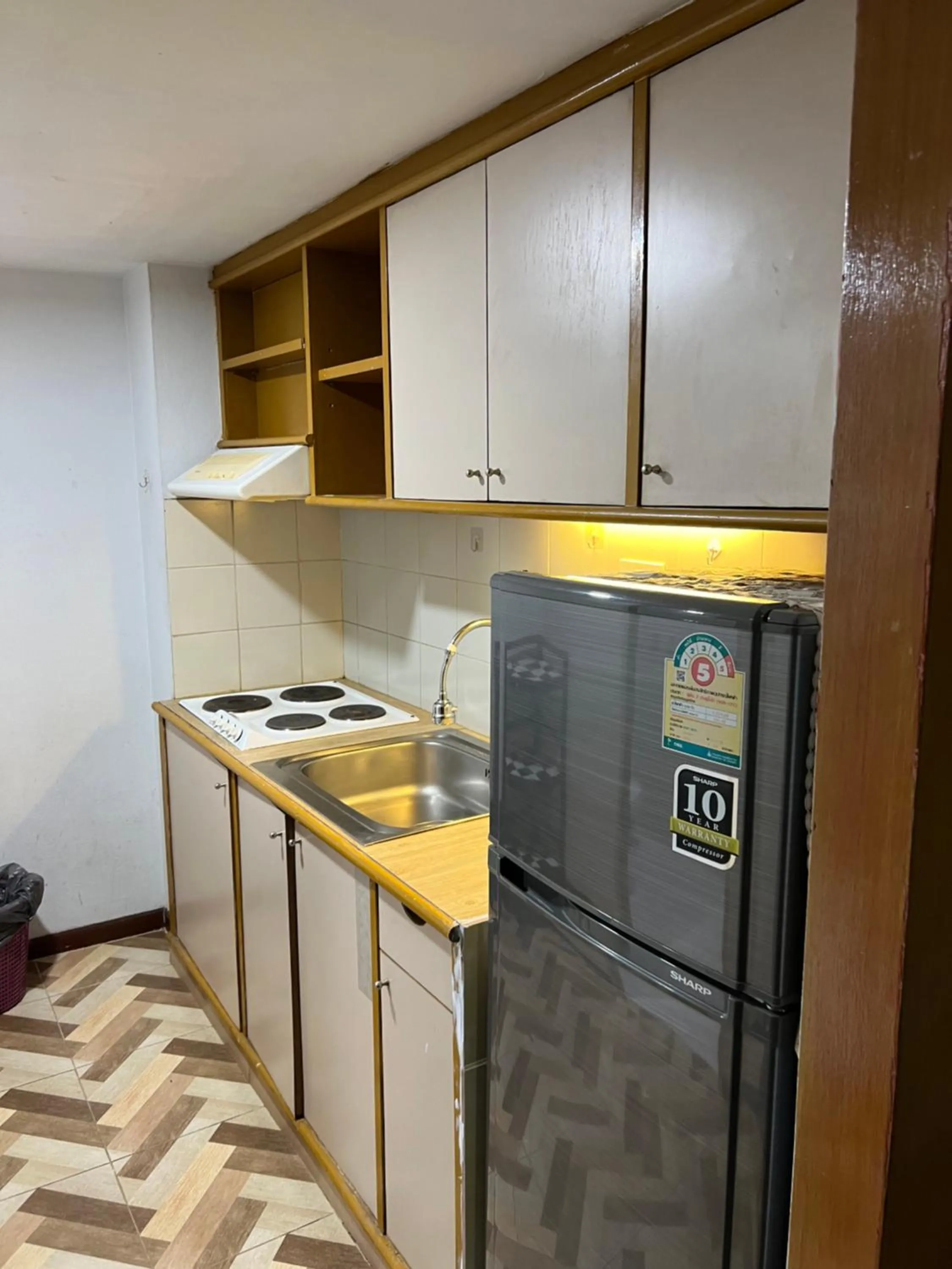 Kitchen or kitchenette in Mall Suites Hotel