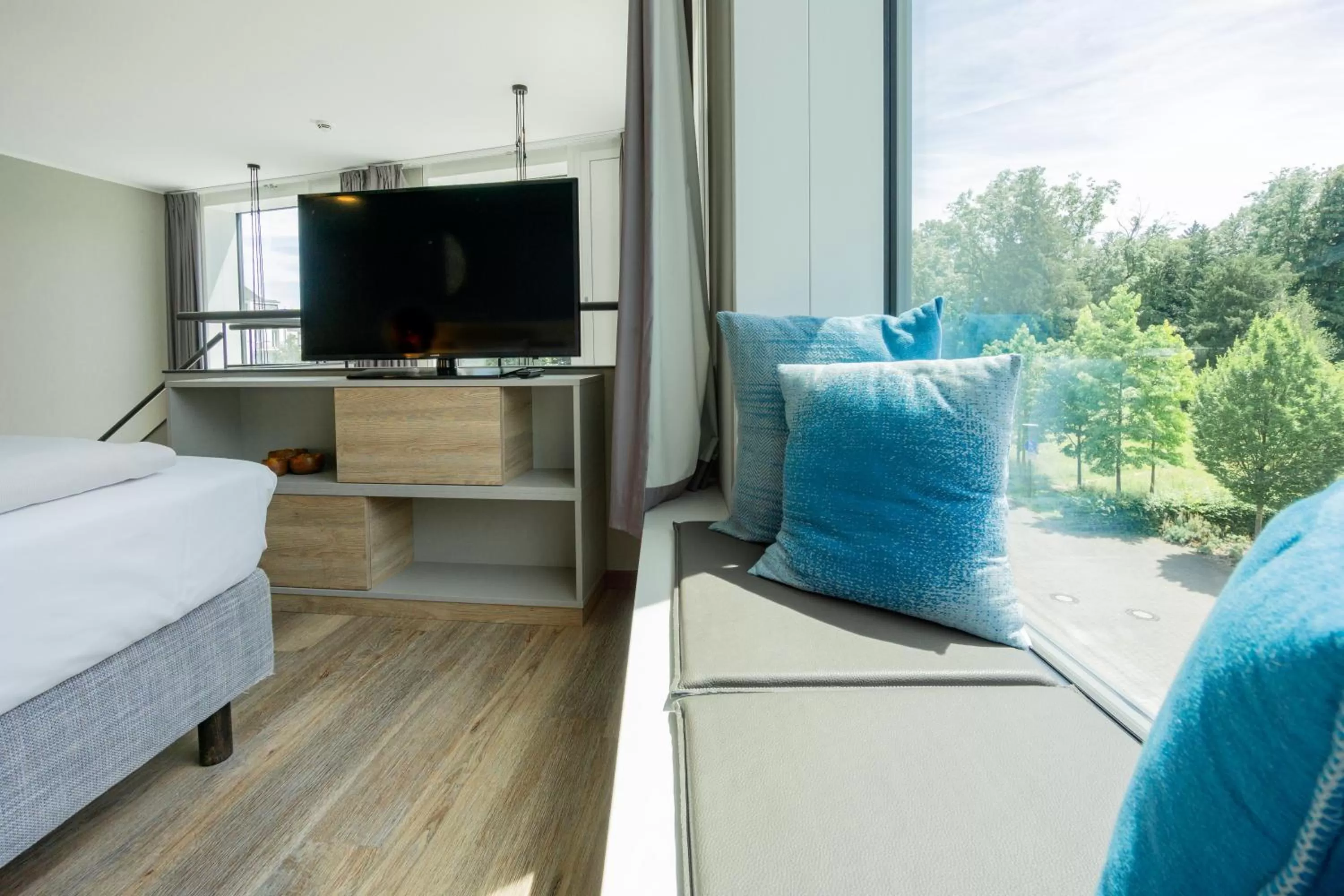 Photo of the whole room, Bed in HARBR Hotel Konstanz, a member of Radisson Individuals