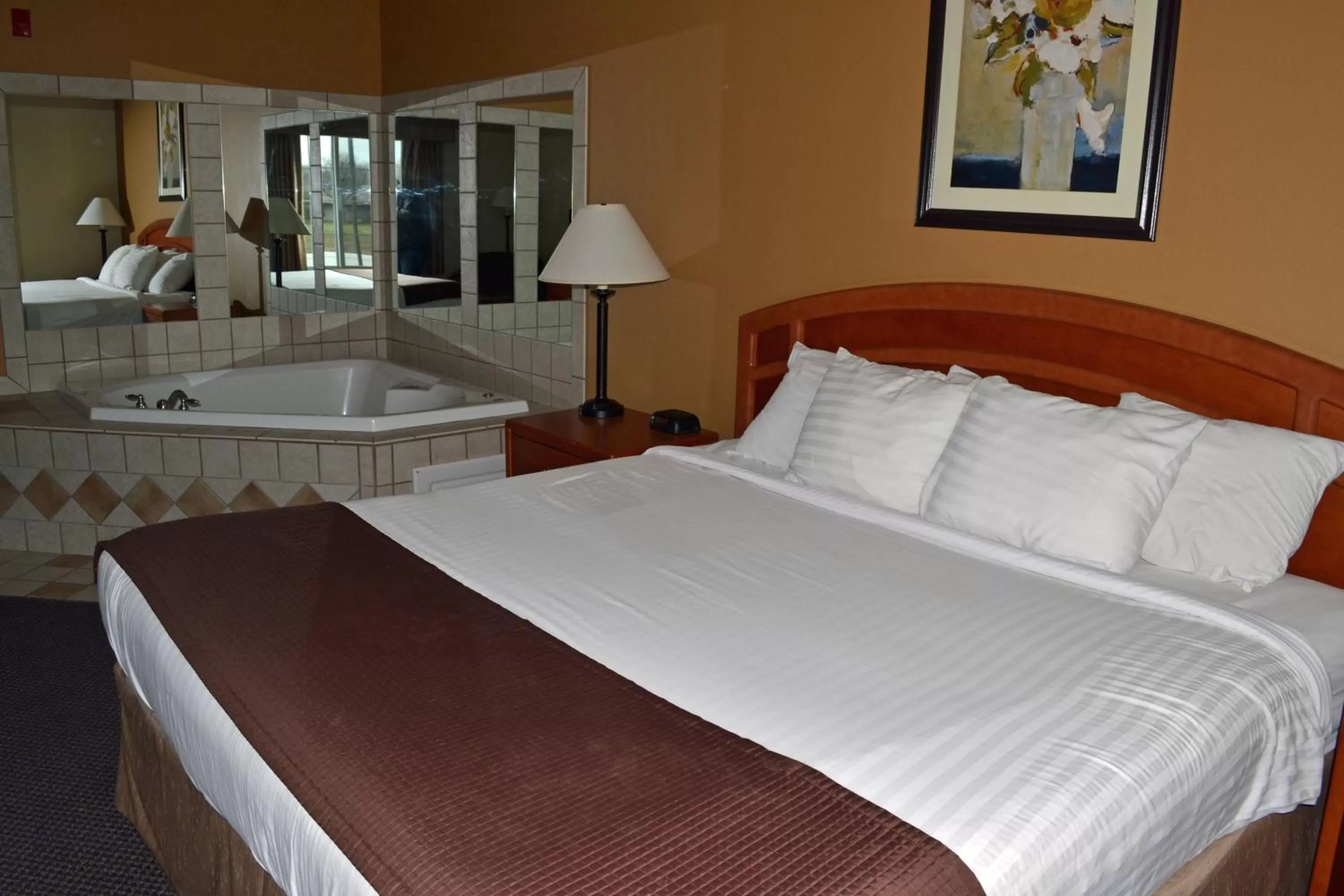 Bedroom, Bed in Paola Inn and Suites