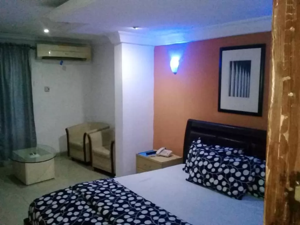 Bed in TheoDawn Hotels @ Suite 29