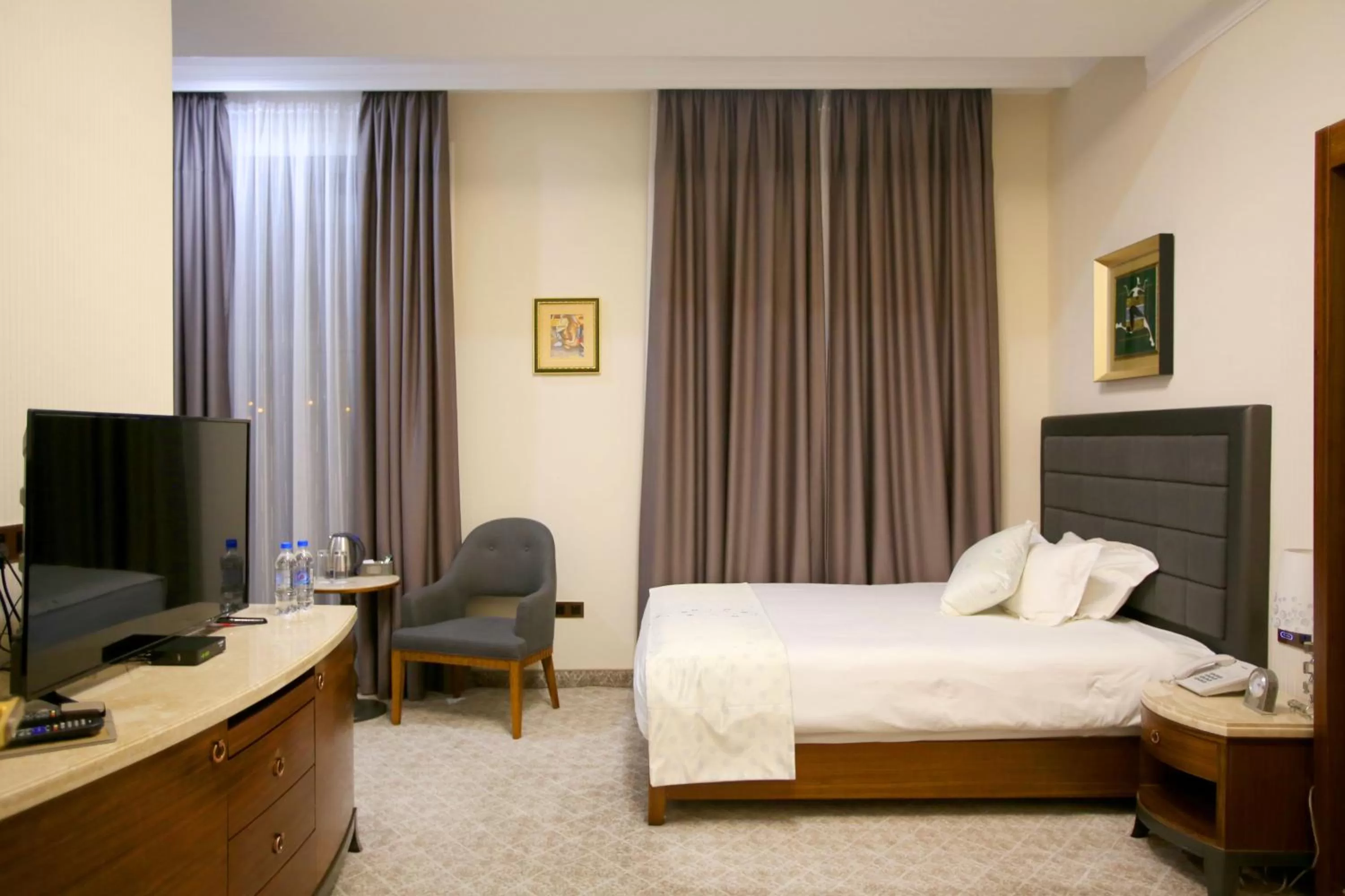 Bed in Parliament Palace Hotel