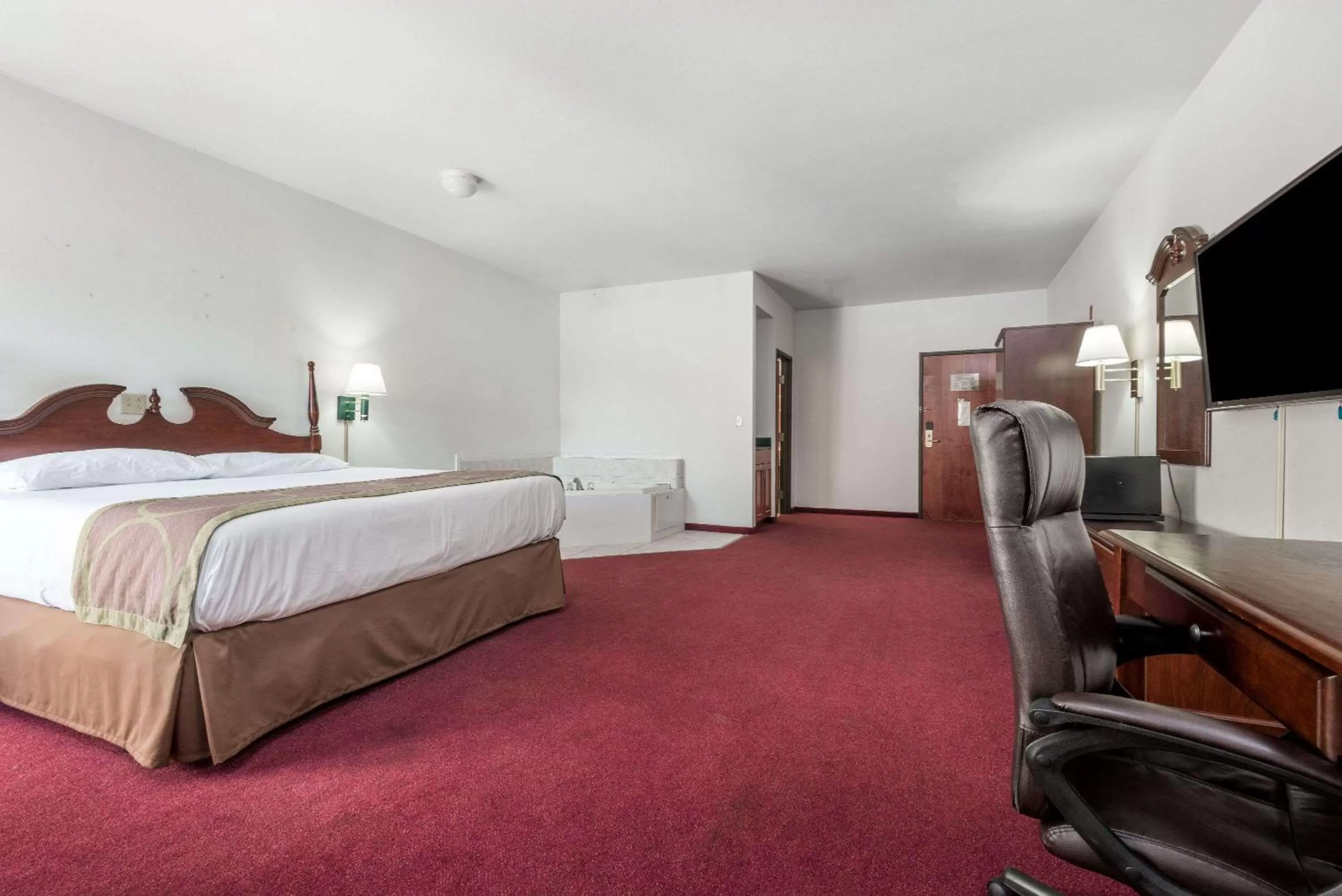 On site, Bed in Super 8 by Wyndham Grayson