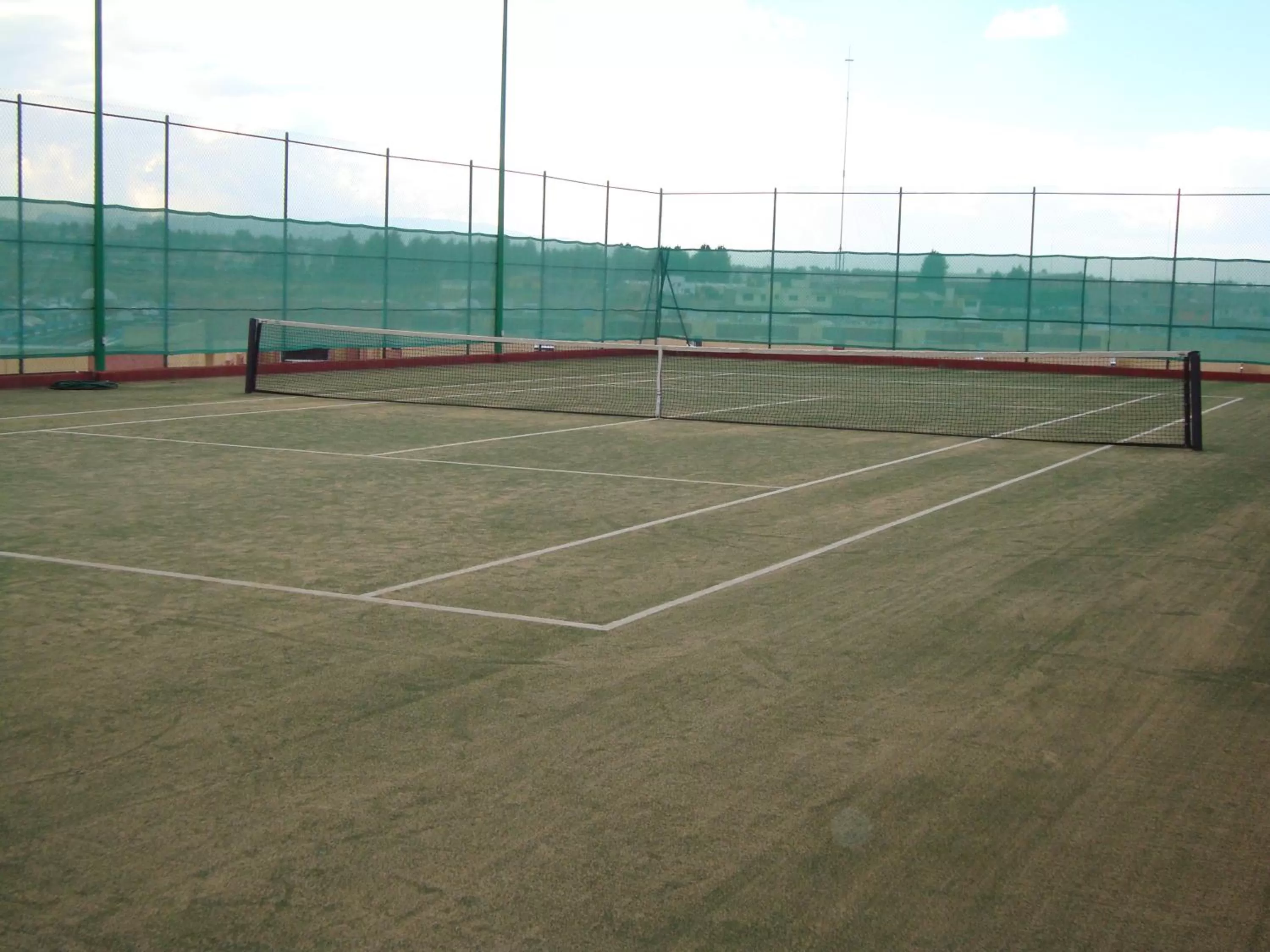 Tennis court in Suites Inn la Muralla Hotel & Spa