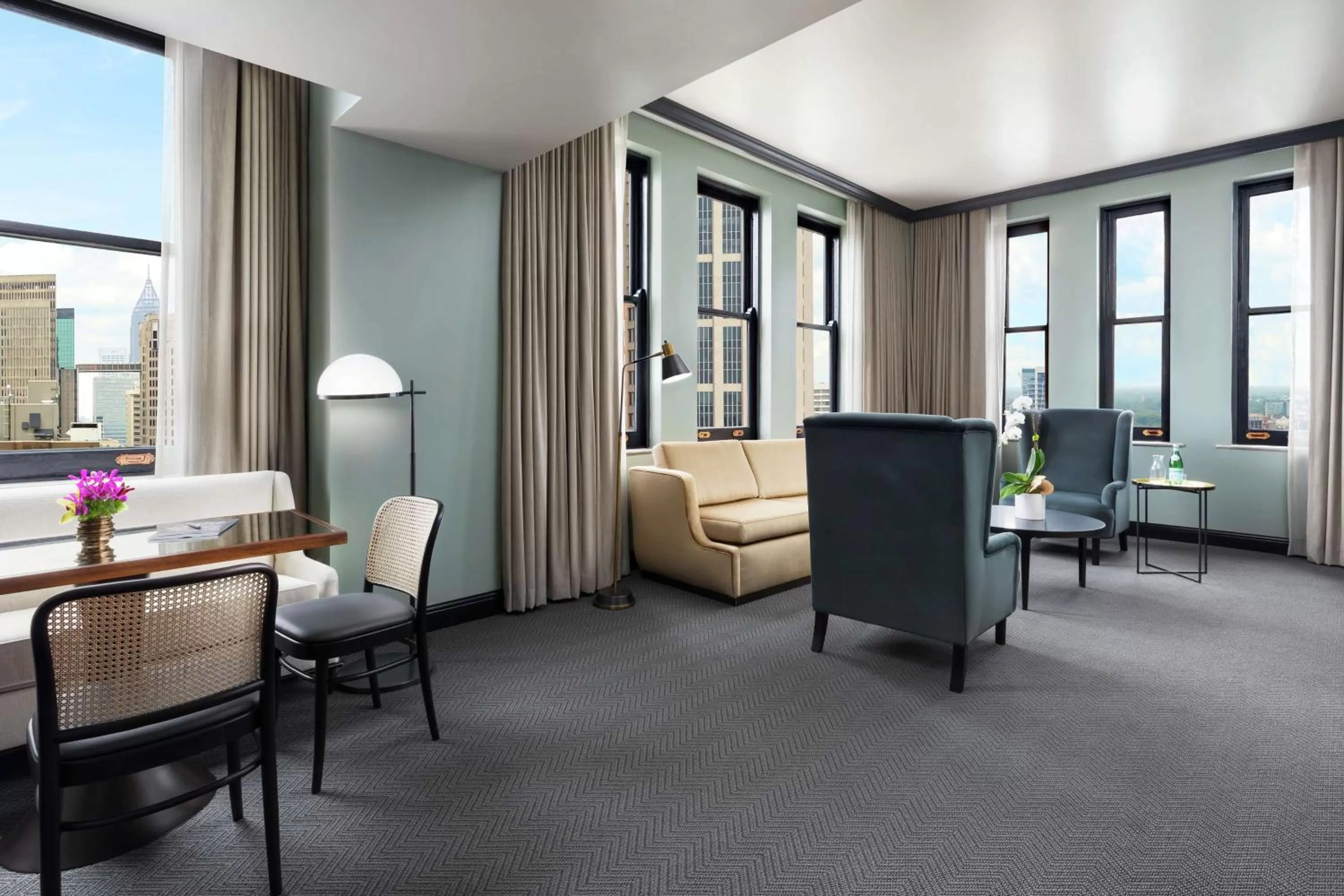 Living room in The Candler Hotel Atlanta, Curio Collection by Hilton