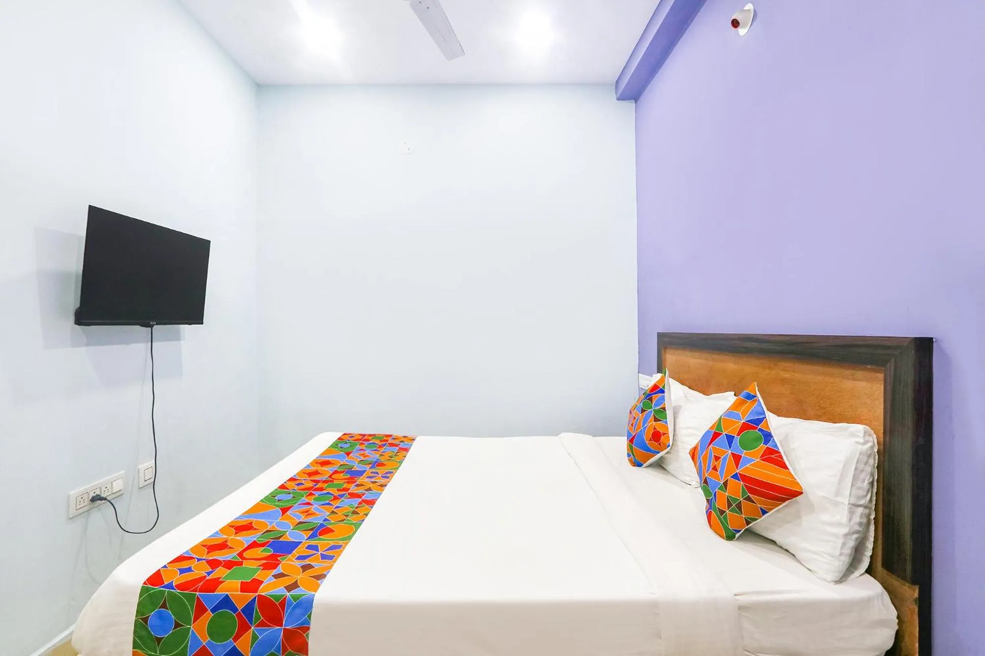 Bed in OYO Flagship Hotel Night Eye Nanakramguda