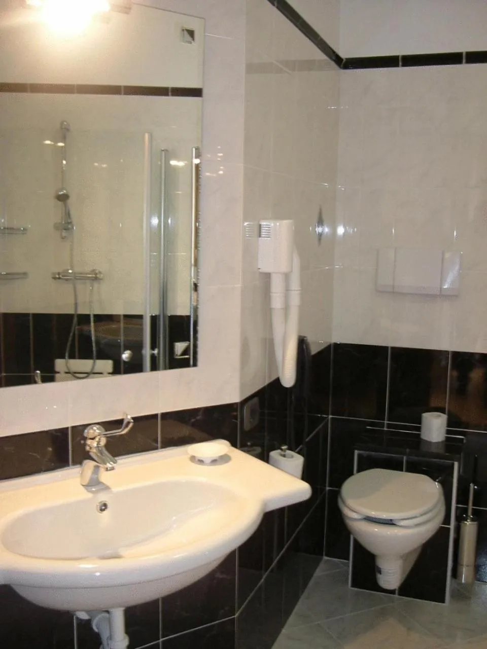 Shower in Hotels Vidi Miramare & Delfino