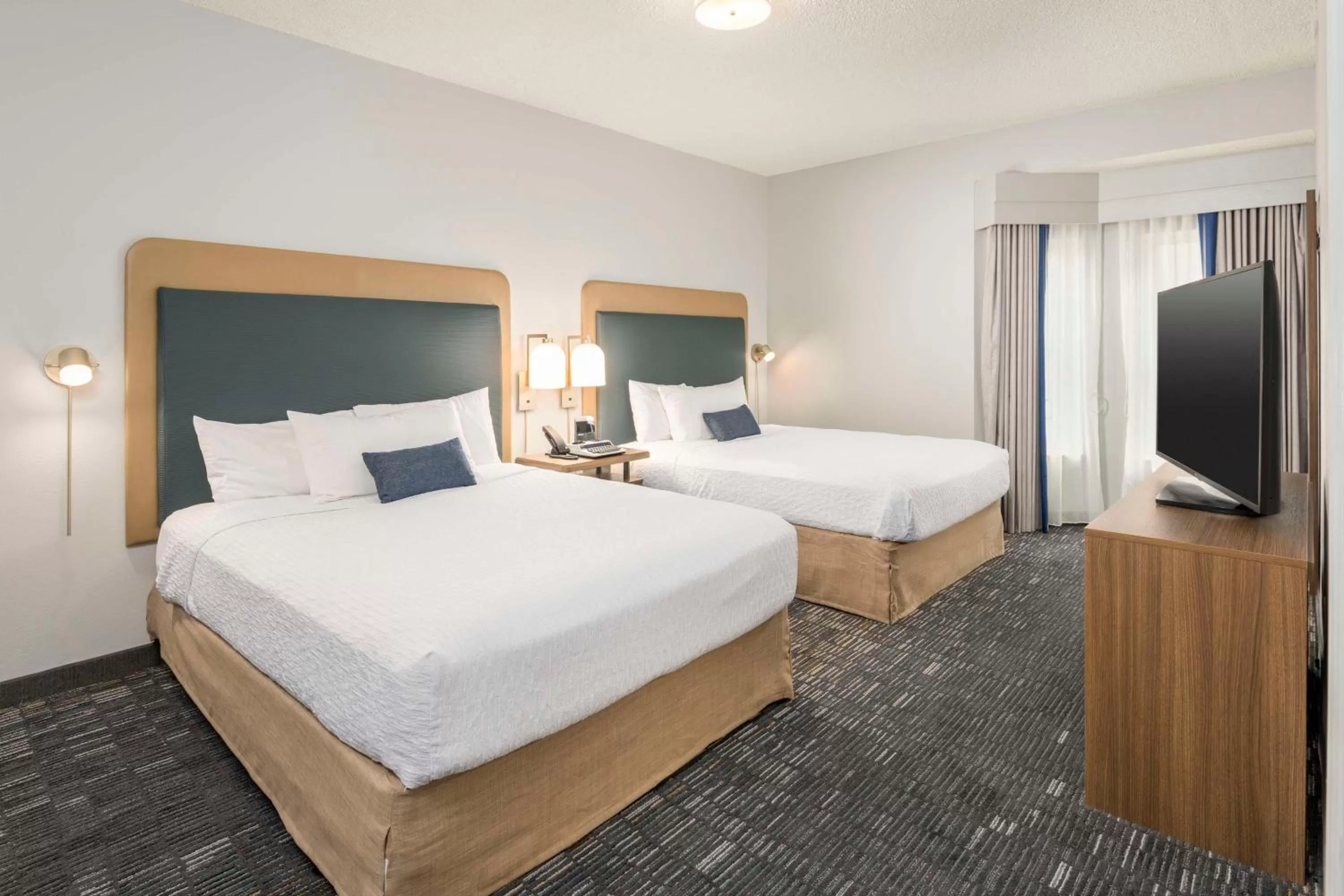 Bed in Homewood Suites by Hilton New Orleans