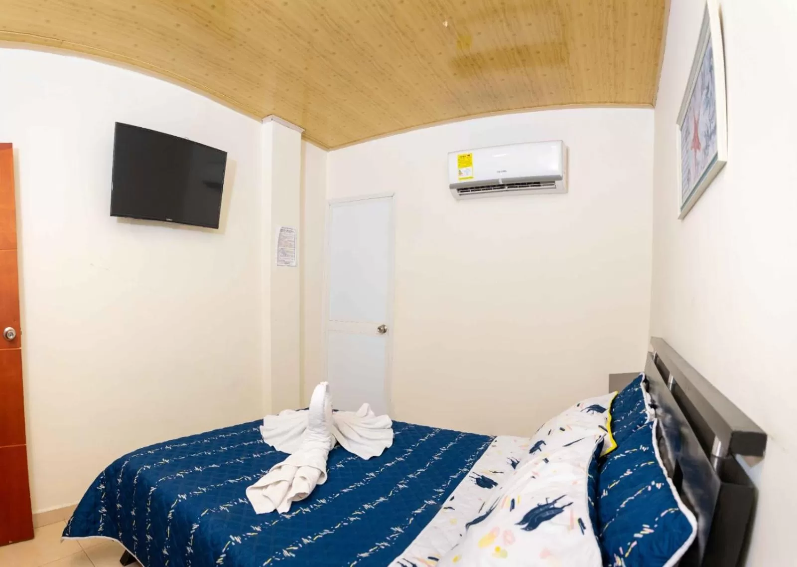 Bed in Hotel The Dolphin