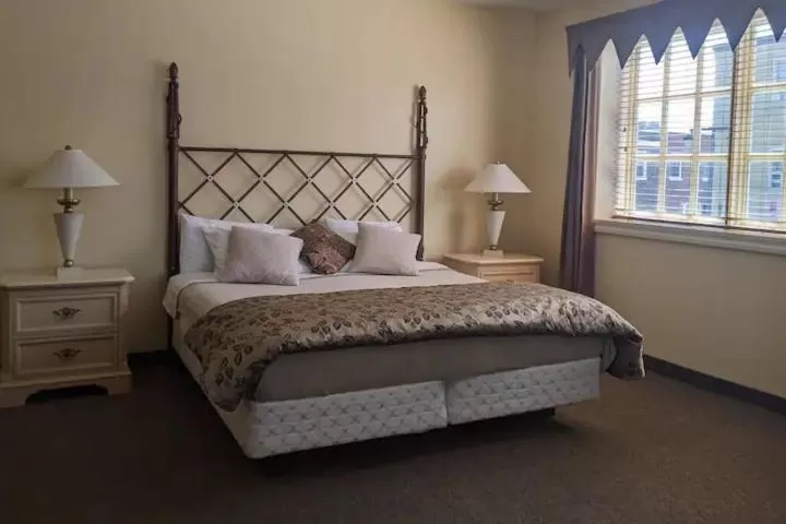 Bed in Rockwell Suites