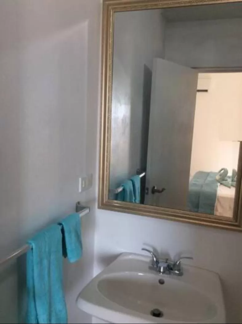 Bathroom in Beach Side Condos Caye Caulker by CCVH